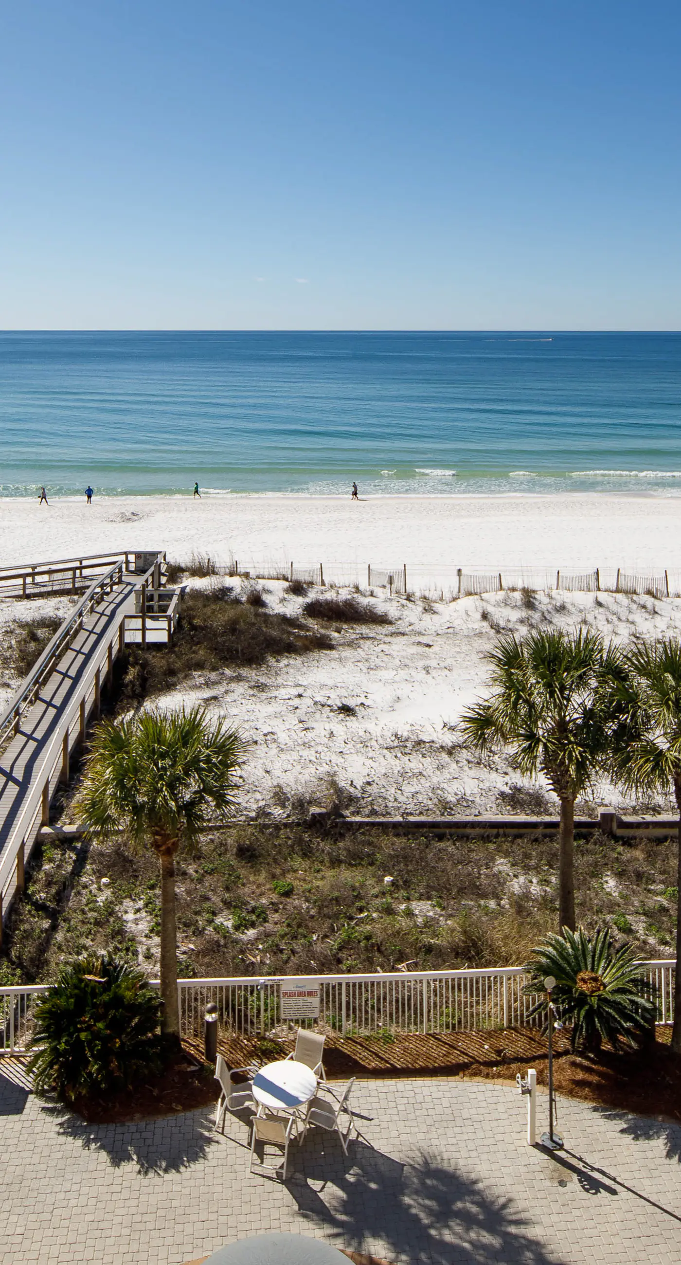 Gulf-view condo with beachfront access, pool, hot tub, gym, AC, & washer&dryer