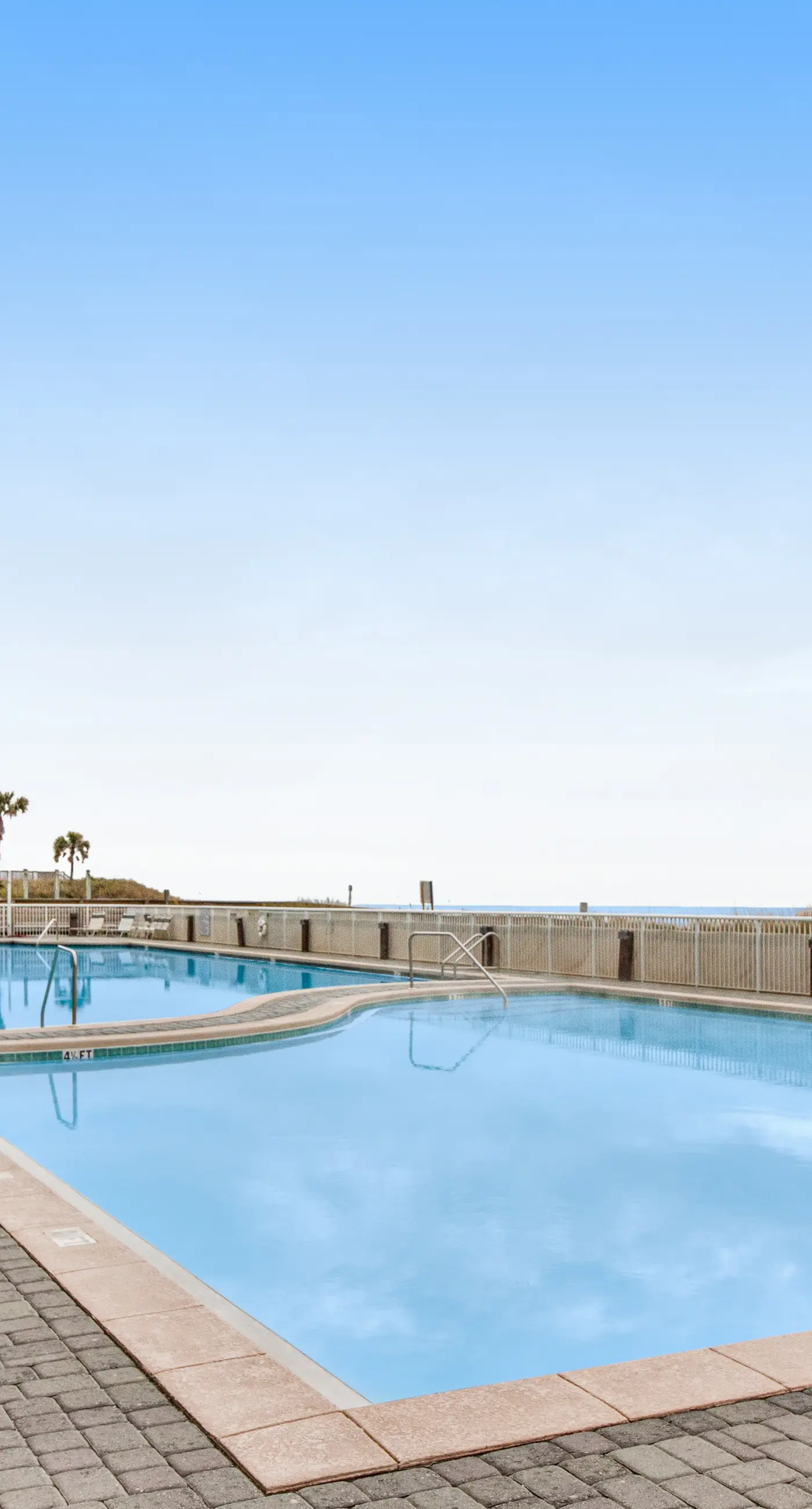 Ocean view condo with beach access, hot tub, outdoor pool, gym, BBQ, patio