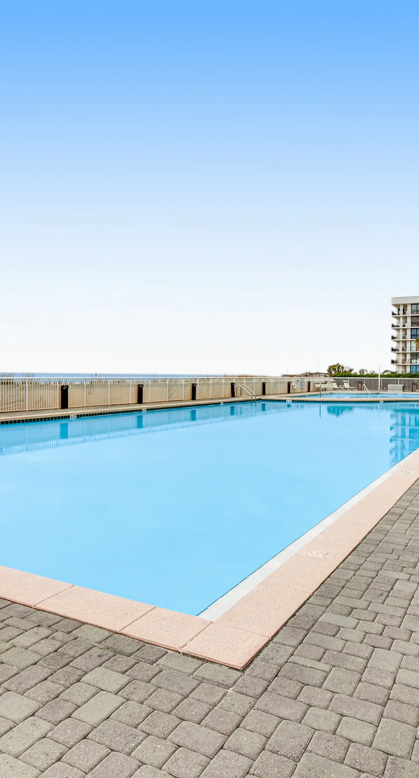 Ocean view condo with beach access, hot tub, outdoor pool, gym, BBQ, patio