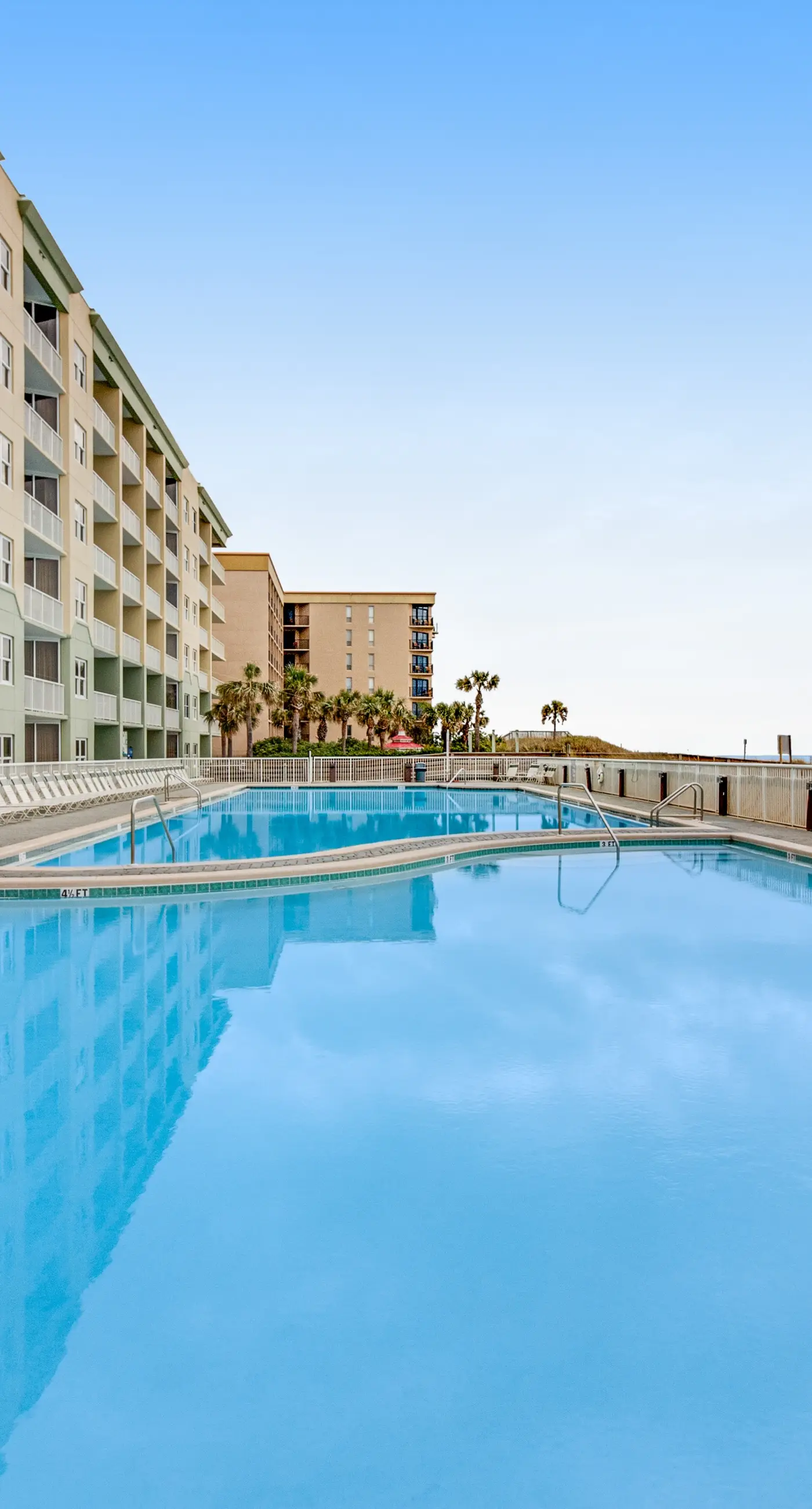 Ocean view condo with beach access, hot tub, outdoor pool, gym, BBQ, patio