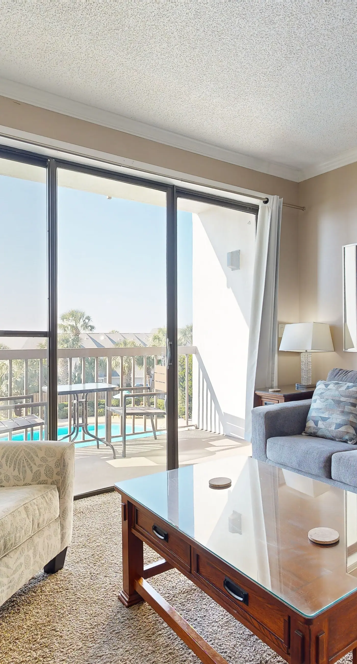 Cozy waterfront condo with central AC, beach access, on-site pool