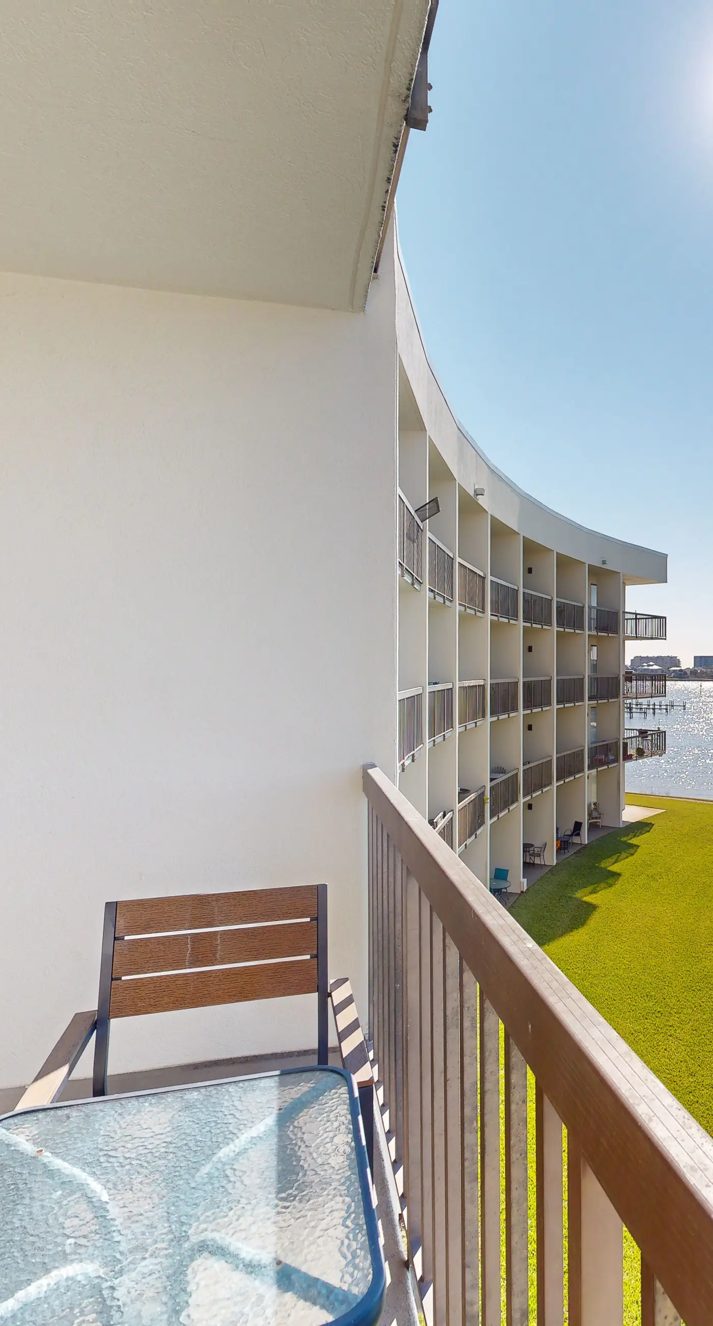 Cozy waterfront condo with central AC, beach access, on-site pool