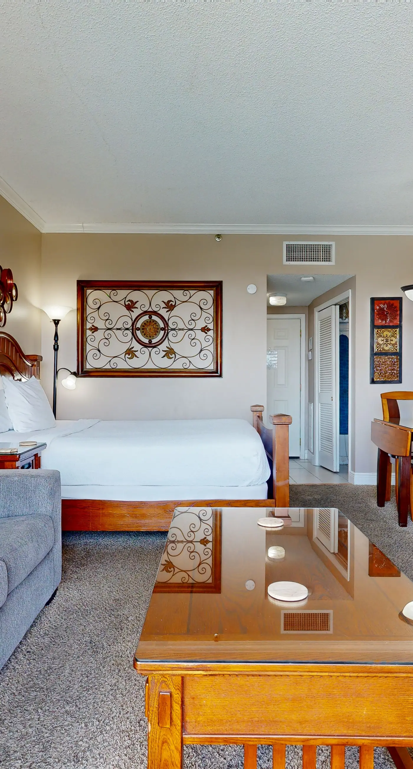 Cozy waterfront condo with central AC, beach access, on-site pool