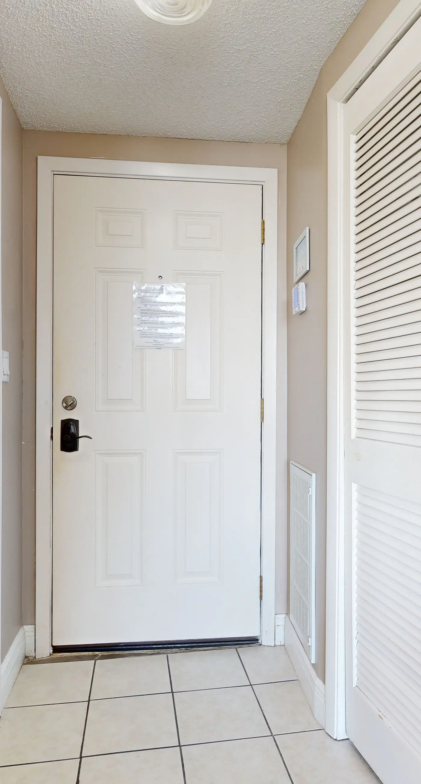 Cozy waterfront condo with central AC, beach access, on-site pool