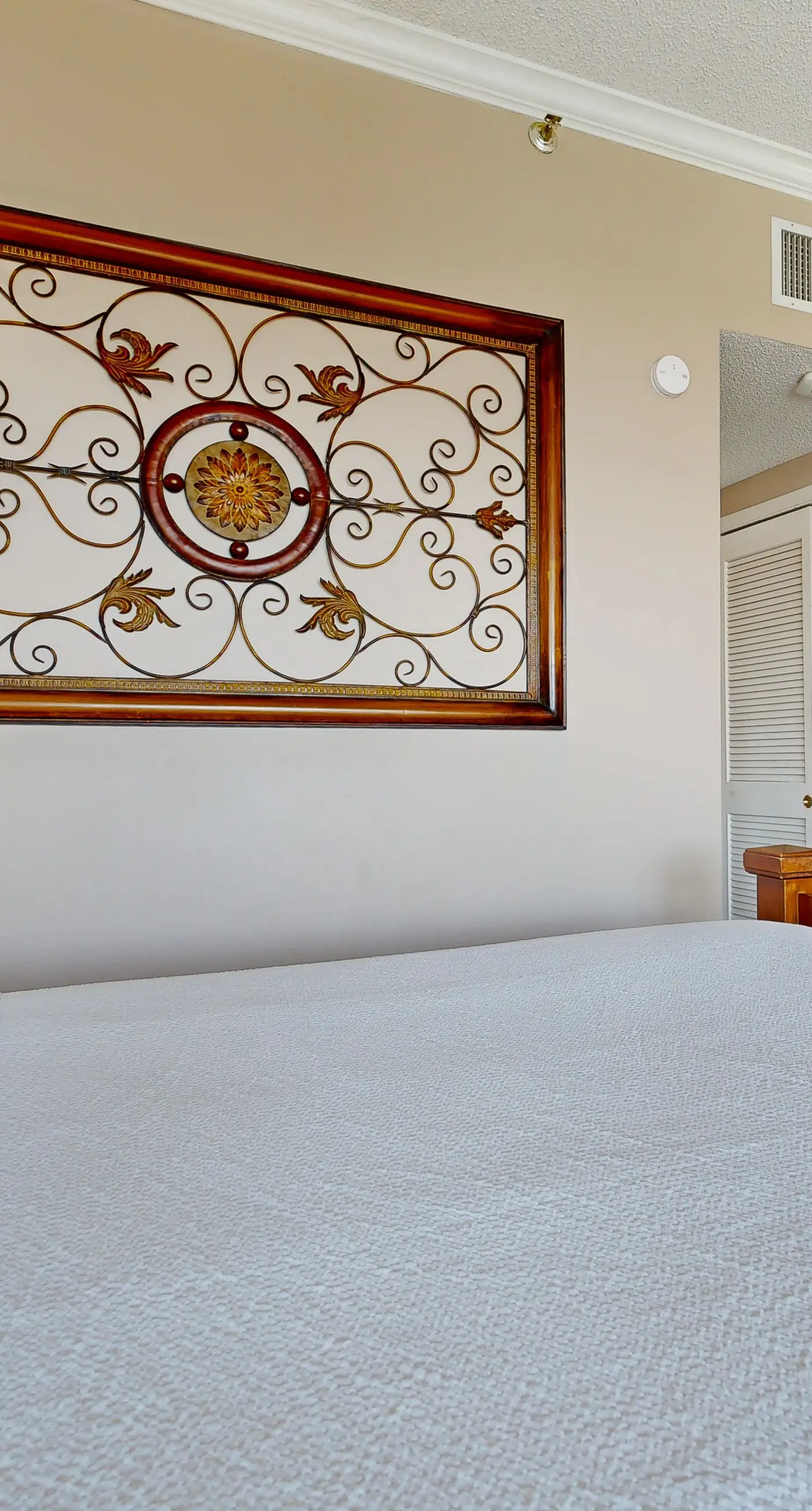 Cozy waterfront condo with central AC, beach access, on-site pool