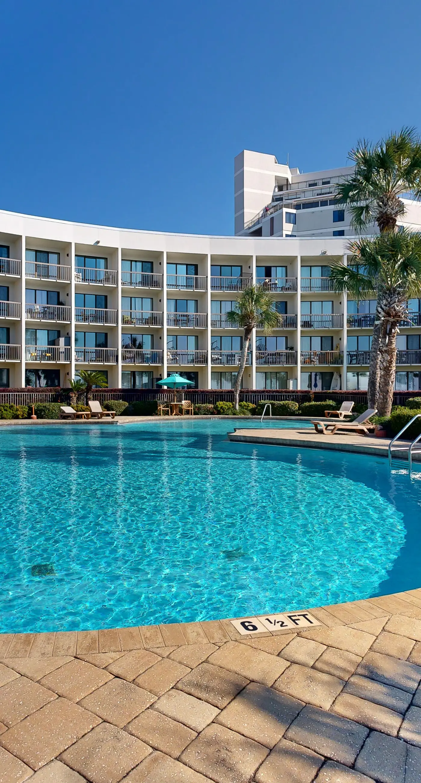 Cozy waterfront condo with central AC, beach access, on-site pool