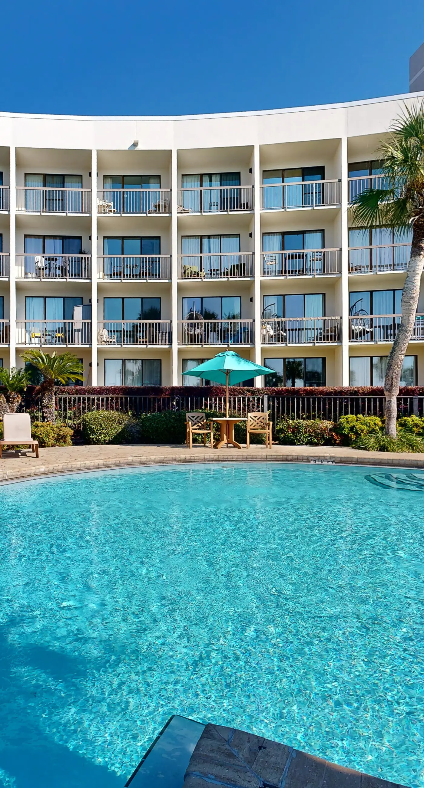 Cozy waterfront condo with central AC, beach access, on-site pool