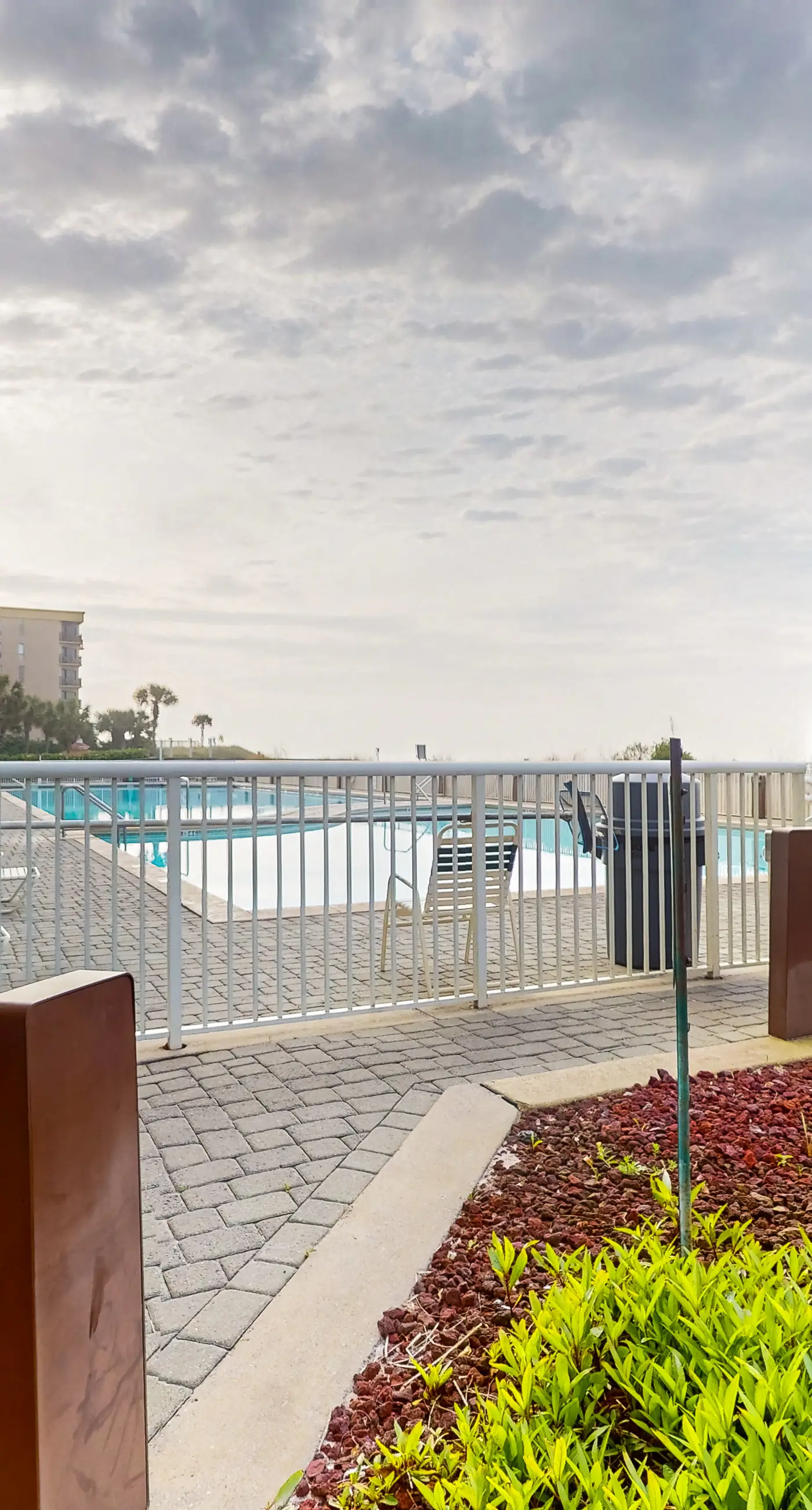 Waters Edge 106- Gulf front condo with furnished patio, pool, fitness room, boardwalk to beach