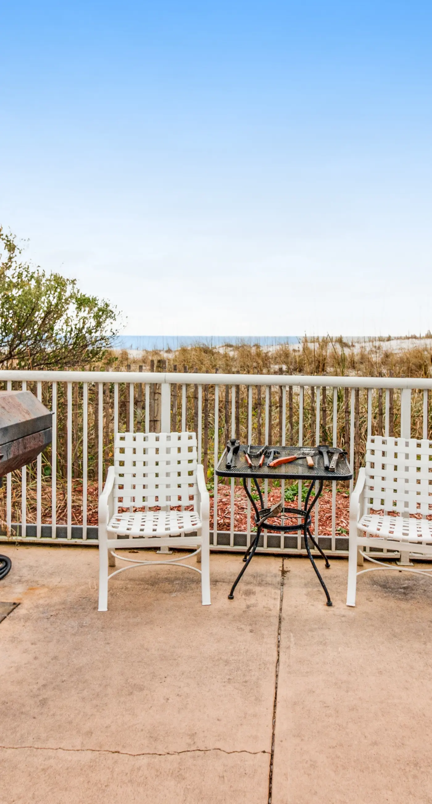 Waters Edge 106- Gulf front condo with furnished patio, pool, fitness room, boardwalk to beach