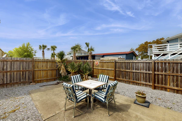 Gulf Getaway with Free WiFi, Wet Bar, Enclosed Yard, & Screened-In Porch