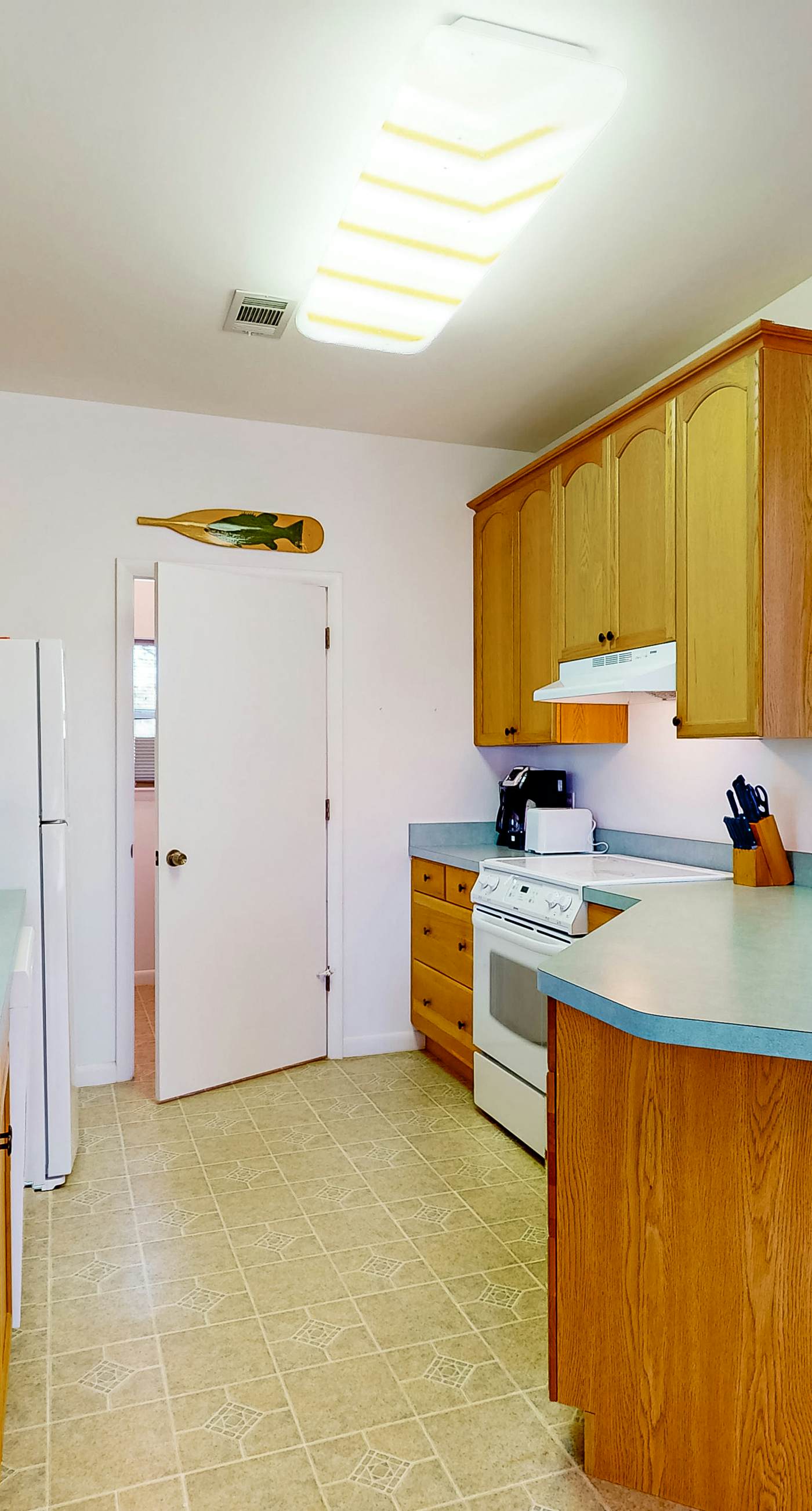 Snowbird-friendly home near the beach with deck, outdoor shower, W/D