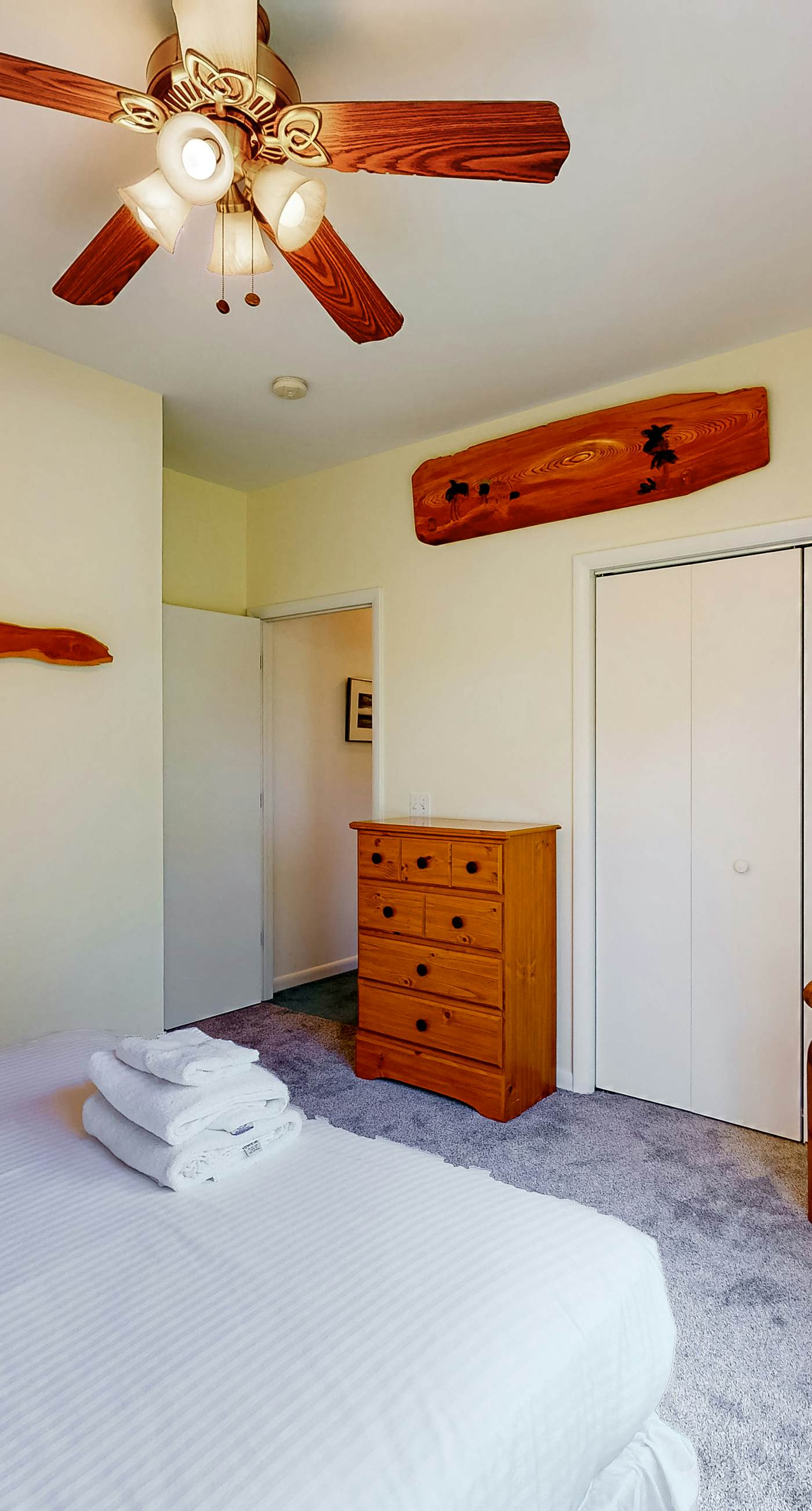 Snowbird-friendly home near the beach with deck, outdoor shower, W/D