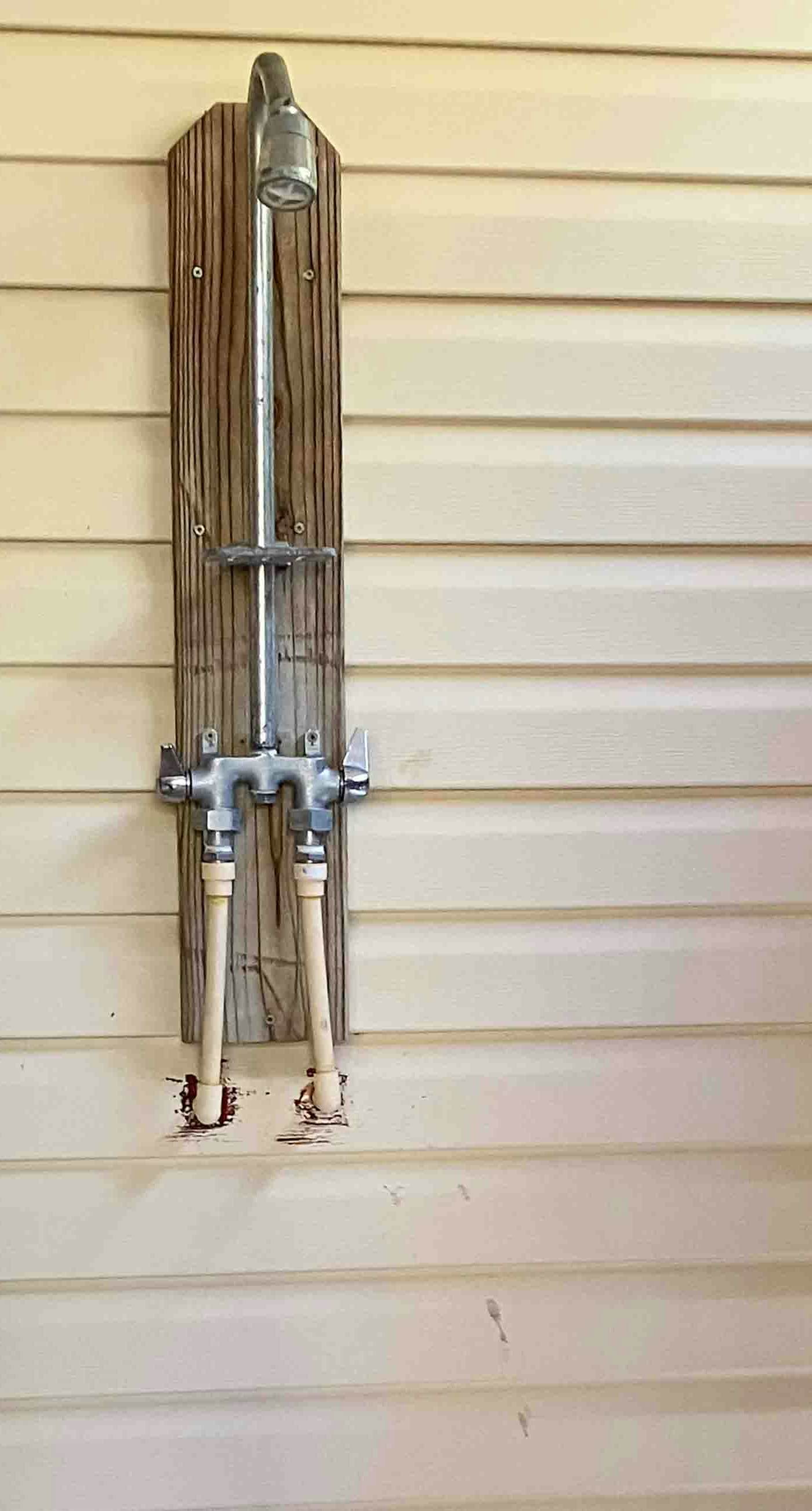 Snowbird-friendly home near the beach with deck, outdoor shower, W/D