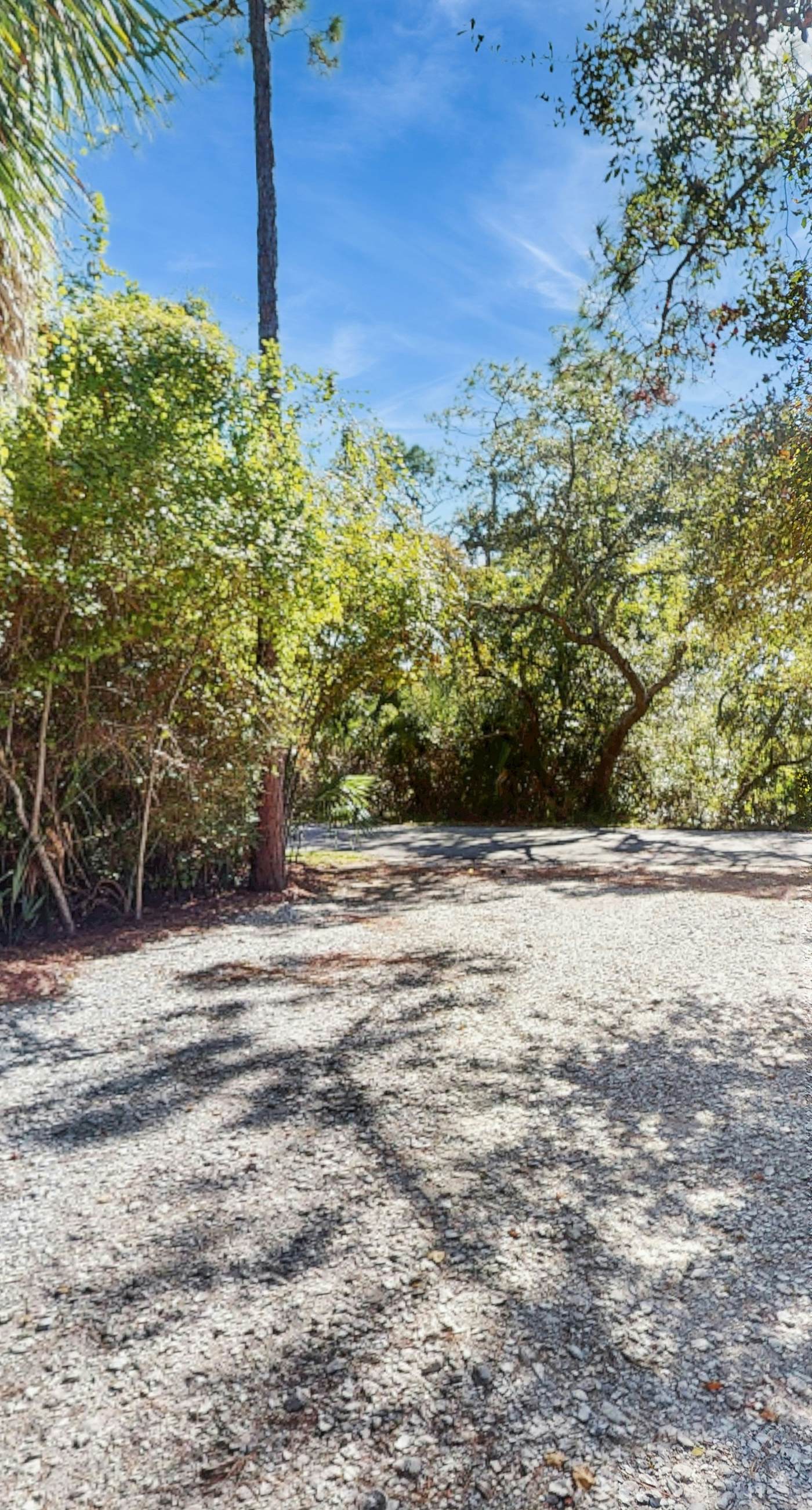 Snowbird-friendly home near the beach with deck, outdoor shower, W/D