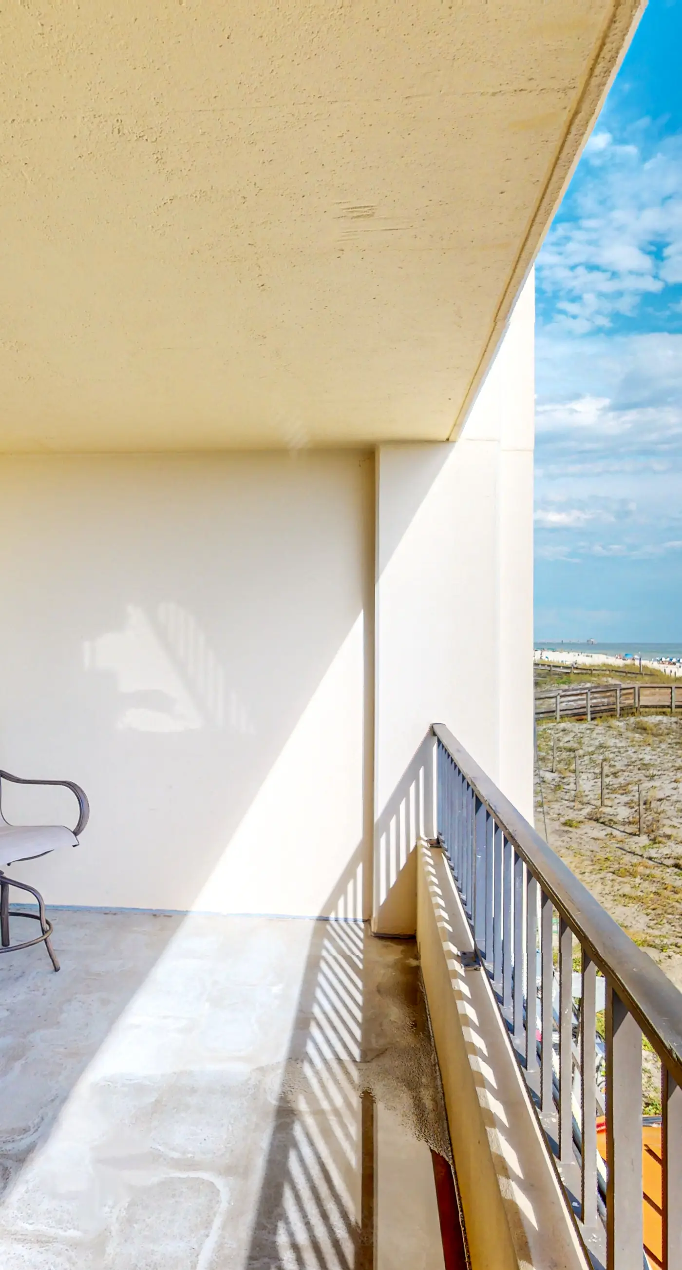 Surf Dweller 203- Beachfront resort condo with outdoor pool, Gulf views, balcony, W/D, & AC