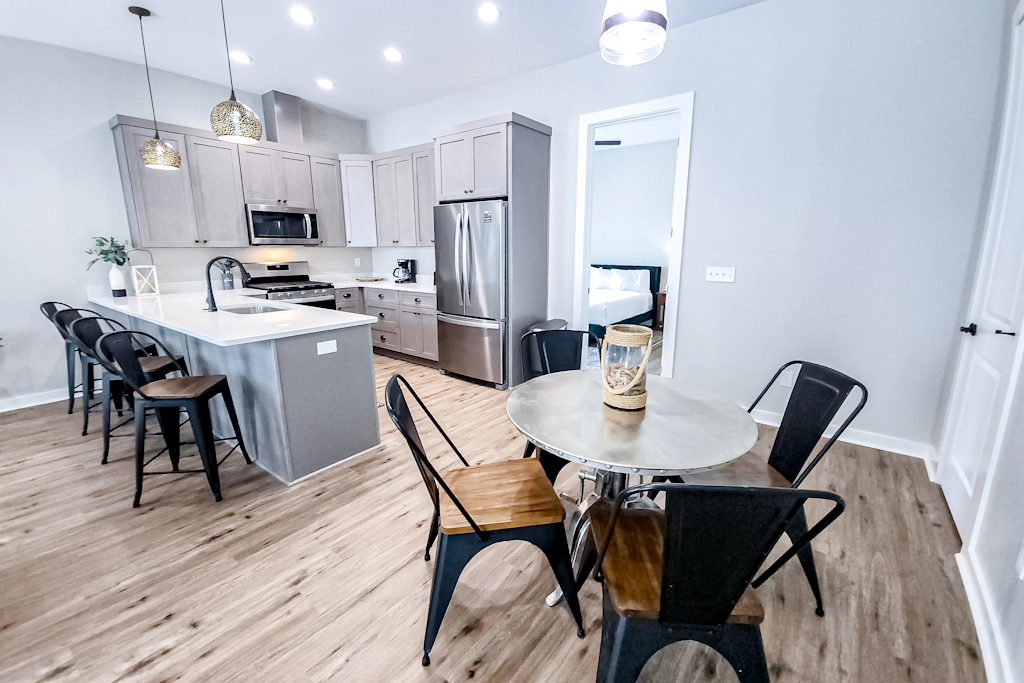 Dog-friendly home with two full kitchens, balcony, AC, washers & dryers