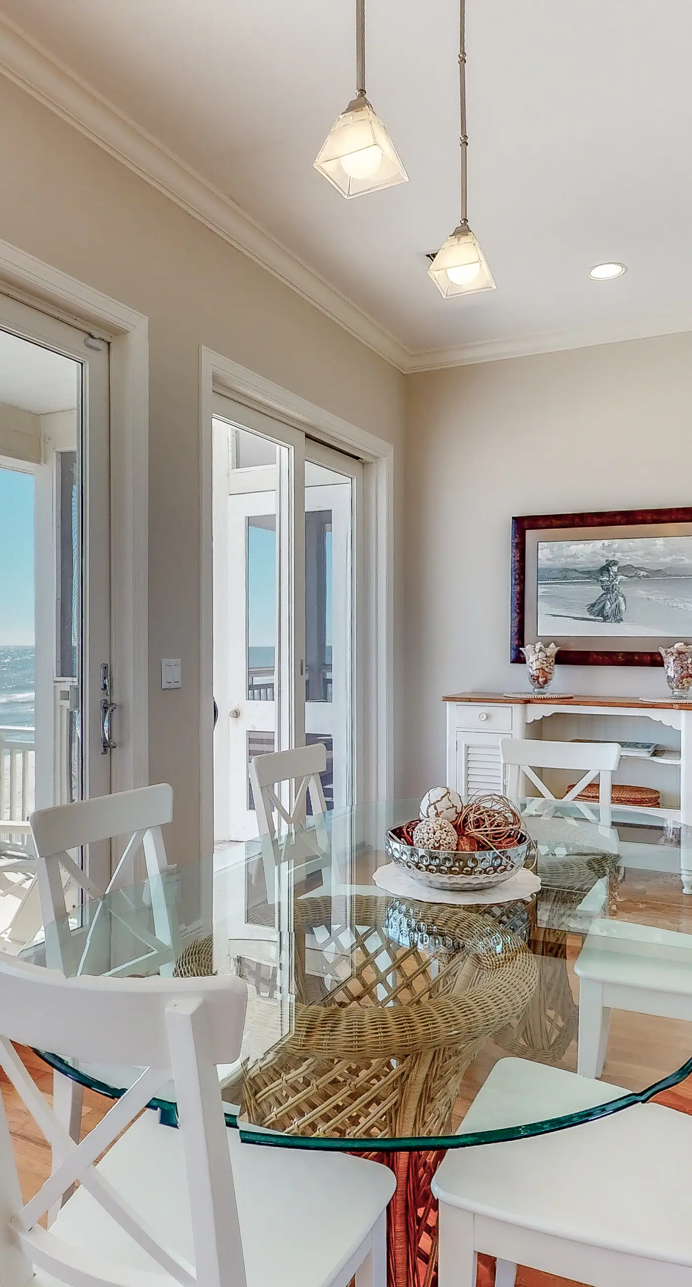 Beachfront home with a porch, washer/dryer, outdoor shower, & AC