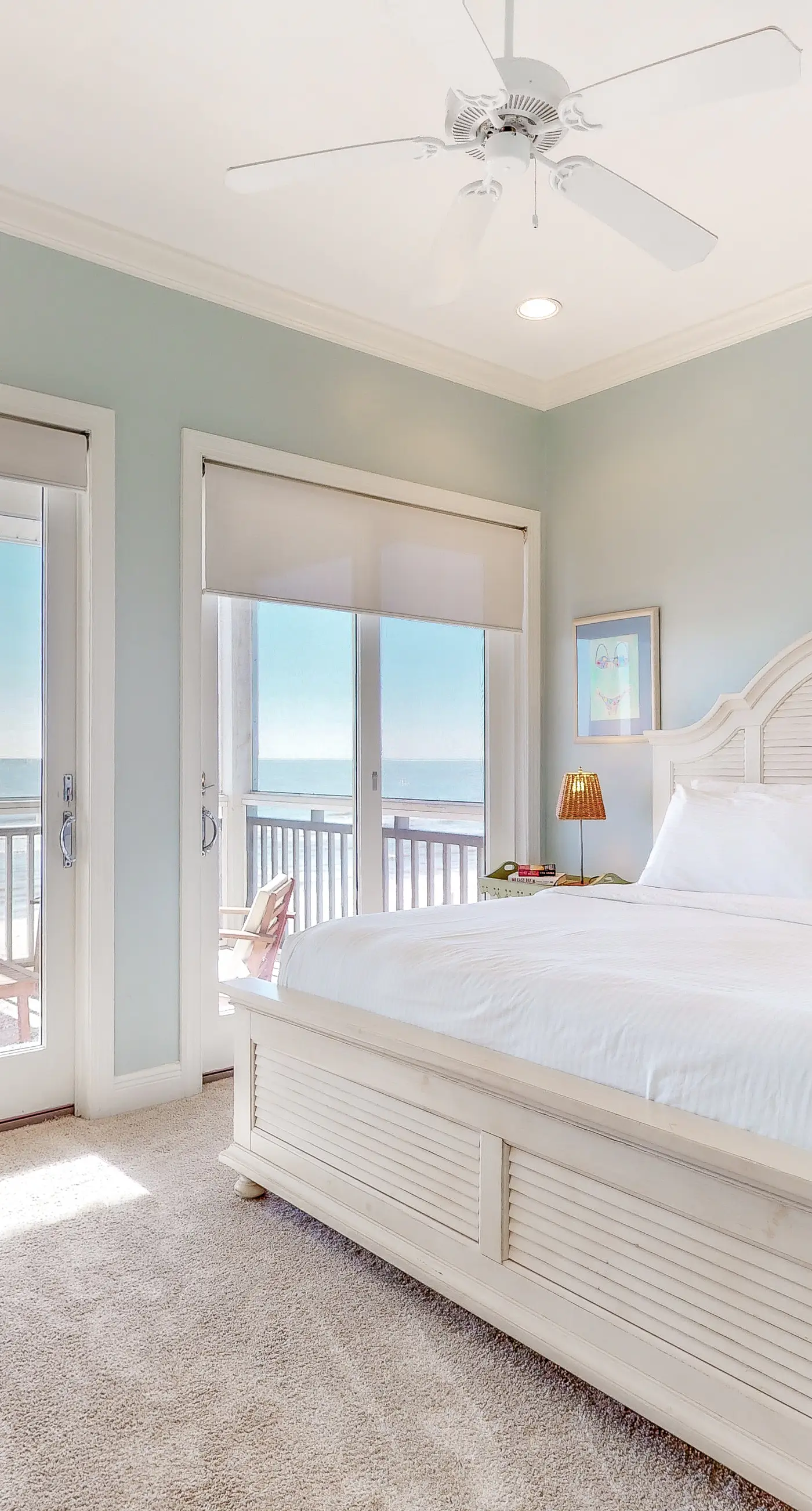 Beachfront home with a porch, washer/dryer, outdoor shower, & AC