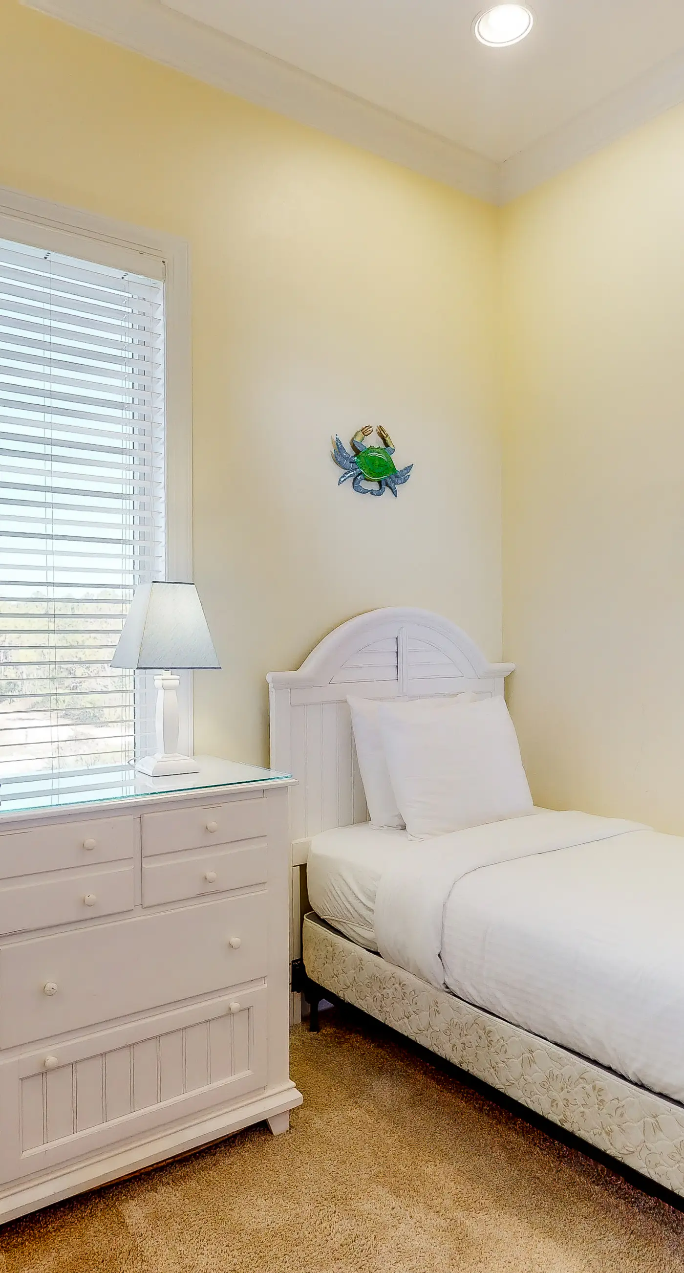 Beachfront home with a porch, washer/dryer, outdoor shower, & AC