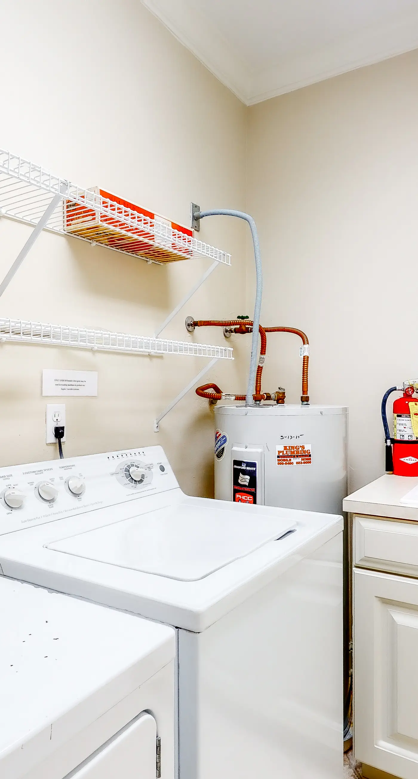 Beachfront home with a porch, washer/dryer, outdoor shower, & AC