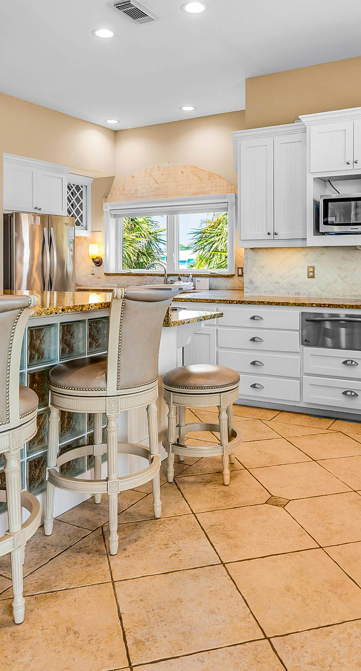 Gulf-front home with direct beach access, Gulf views, yard, & deck