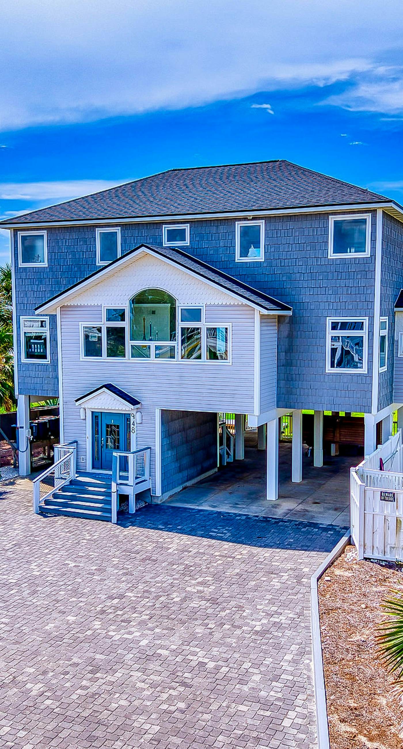 Gulf-front home with direct beach access, Gulf views, yard, & deck