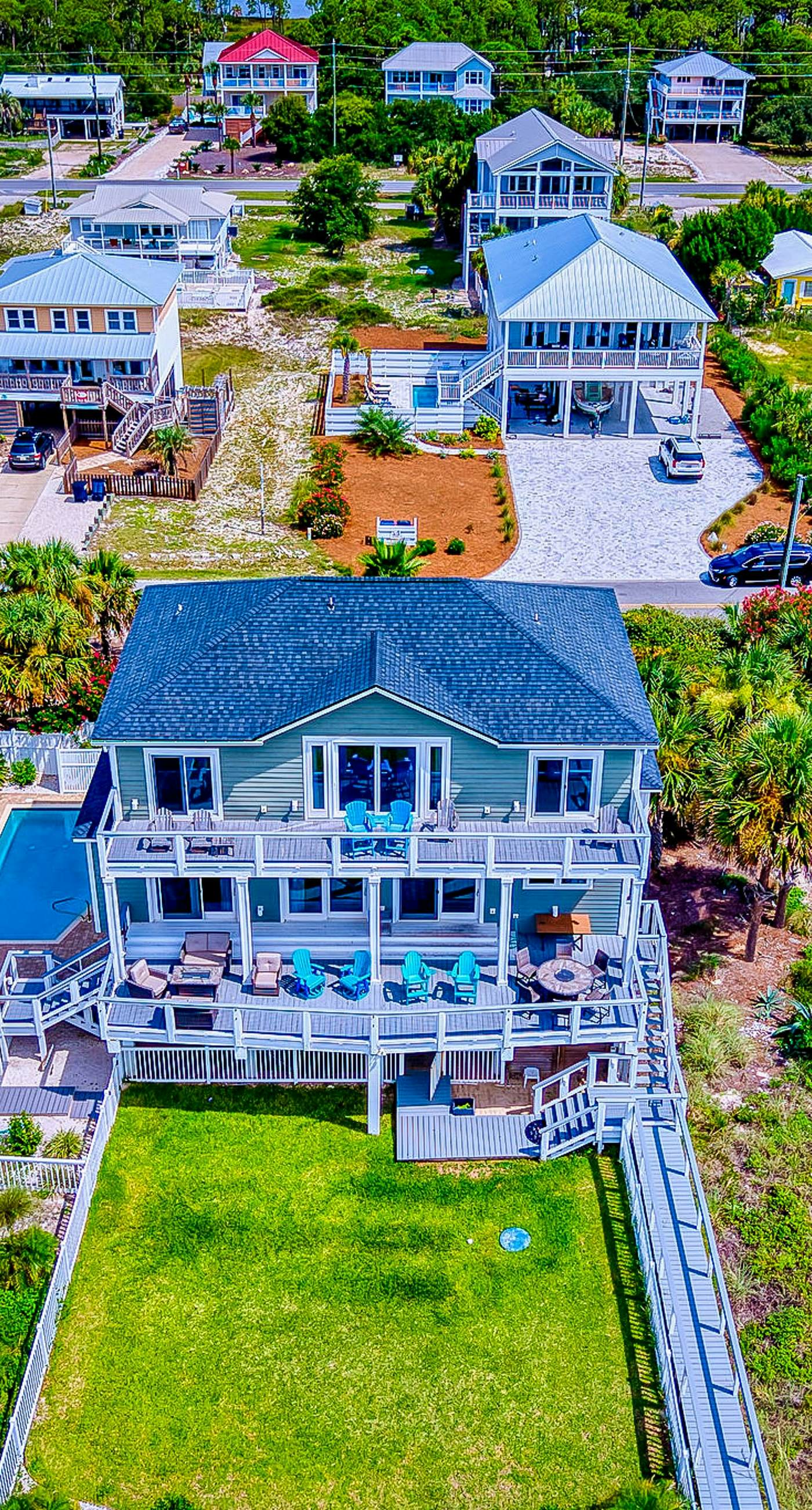 Gulf-front home with direct beach access, Gulf views, yard, & deck