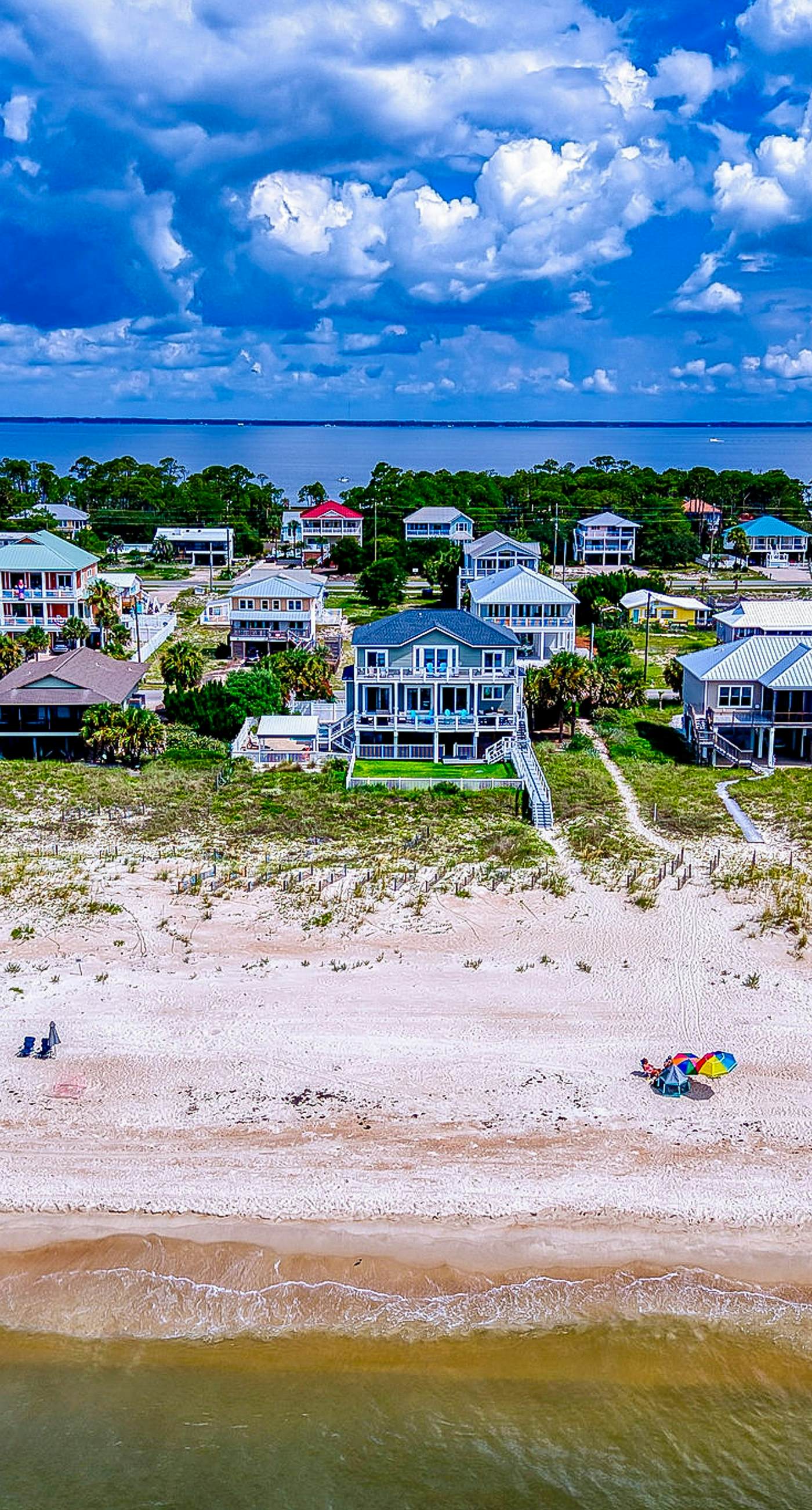 Gulf-front home with direct beach access, Gulf views, yard, & deck