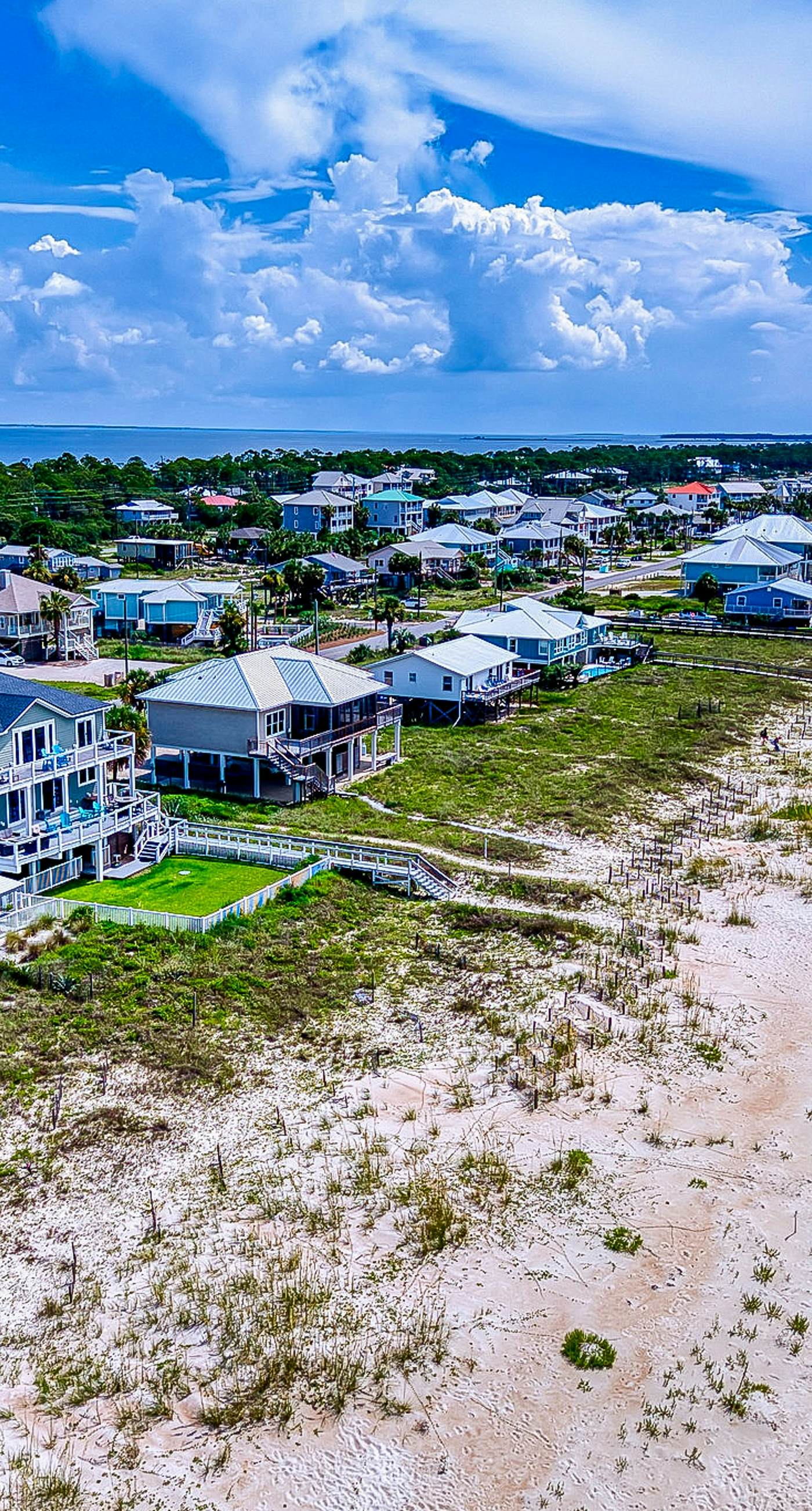 Gulf-front home with direct beach access, Gulf views, yard, & deck