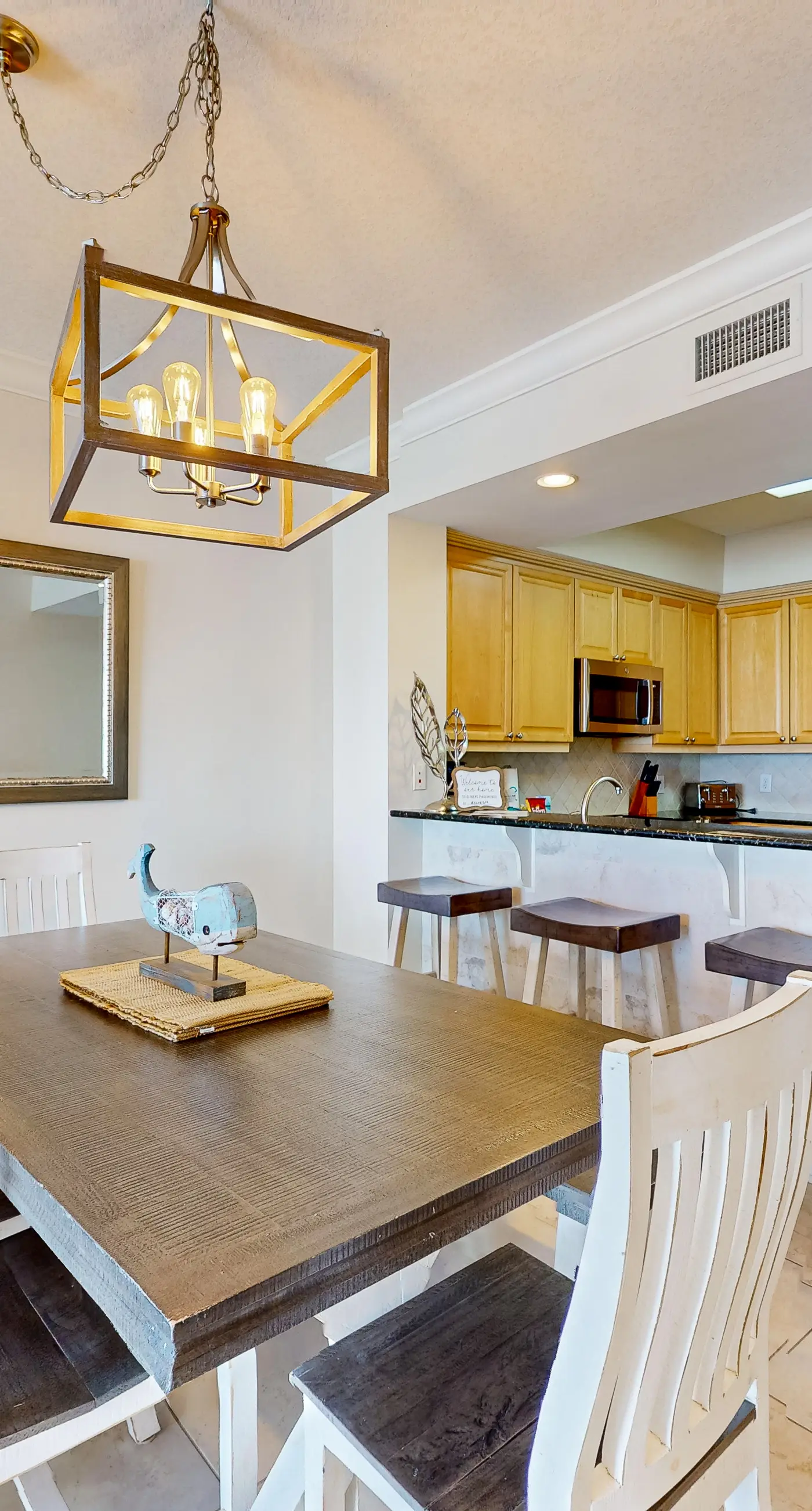 Beachfront condo with balcony, hot tub, pool, gym, open layout, W&D, & AC