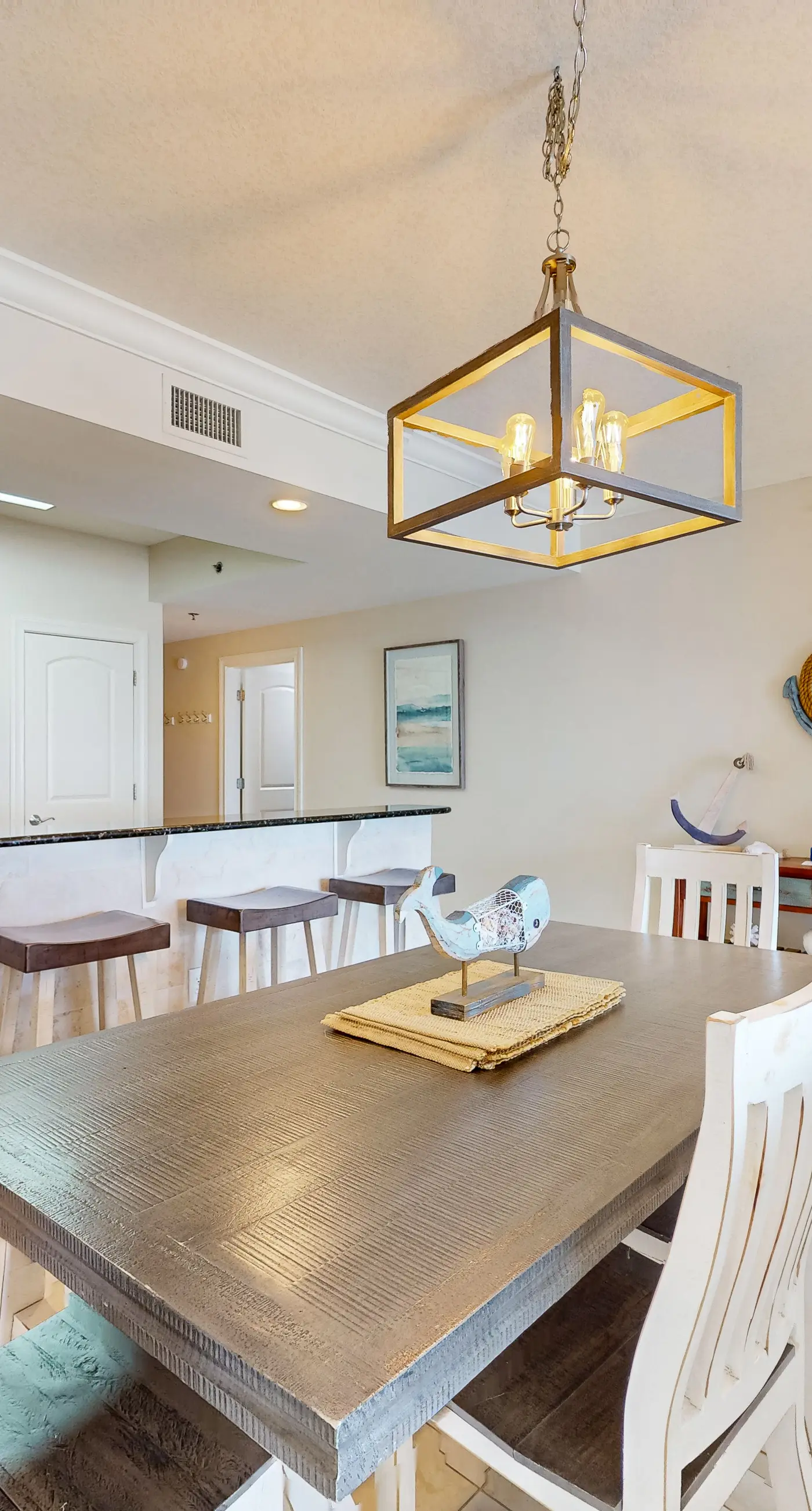 Beachfront condo with balcony, hot tub, pool, gym, open layout, W&D, & AC