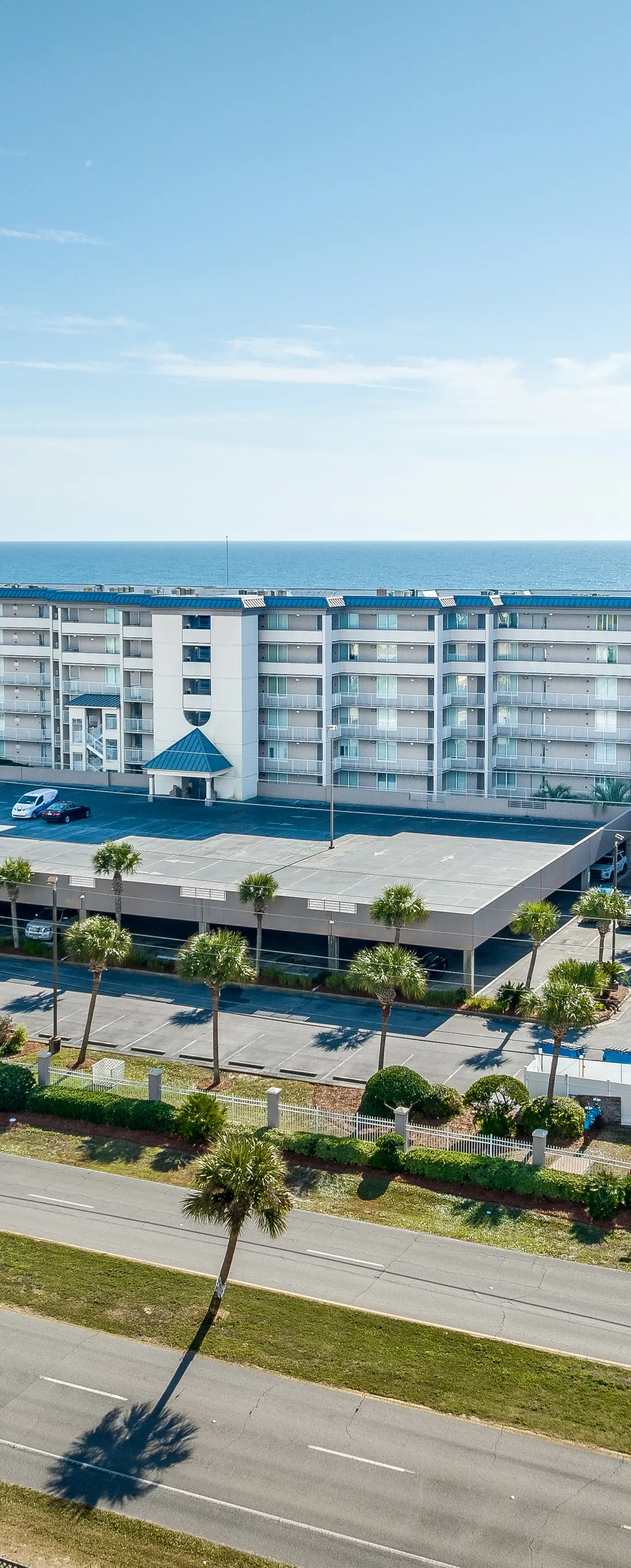 Island Princess 411- Seaside condo with wonderful beach views, balcony, grill, pool, hot tub, & gym