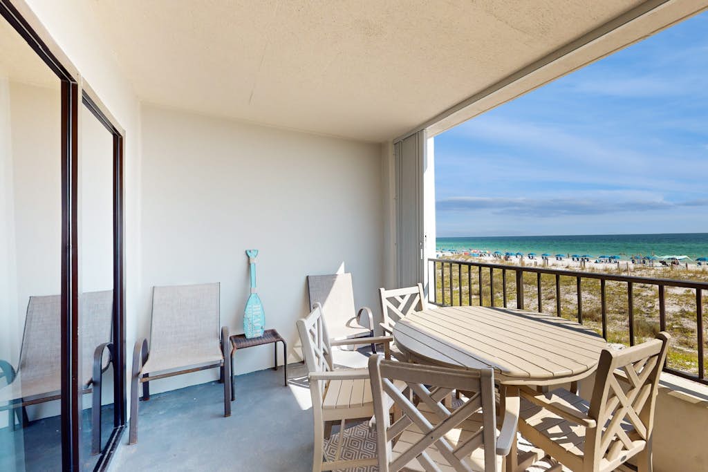 Beachfront condo with Gulf views, pool, tennis, gym, & private balcony