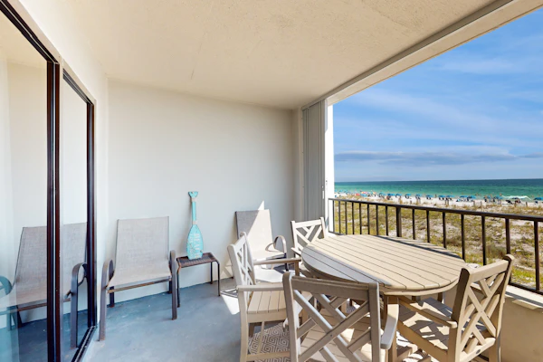 Beachfront condo with Gulf views, pool, tennis, gym, & private balcony
