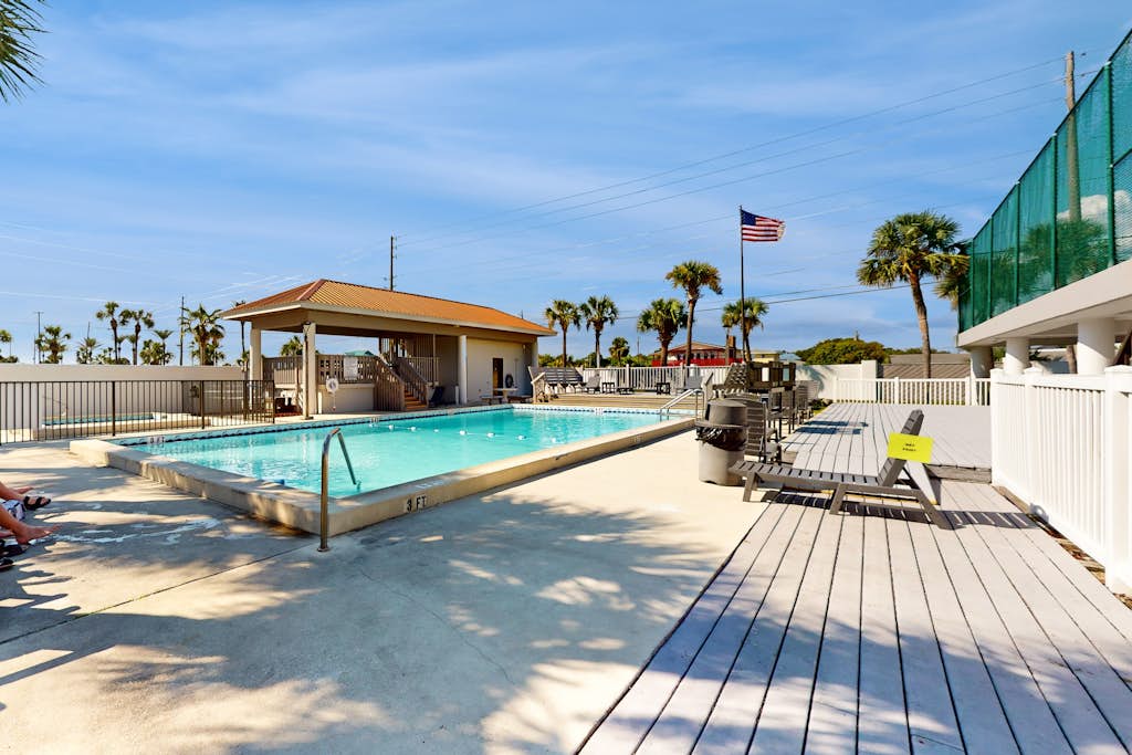 Beachfront condo with Gulf views, pool, tennis, gym, & private balcony