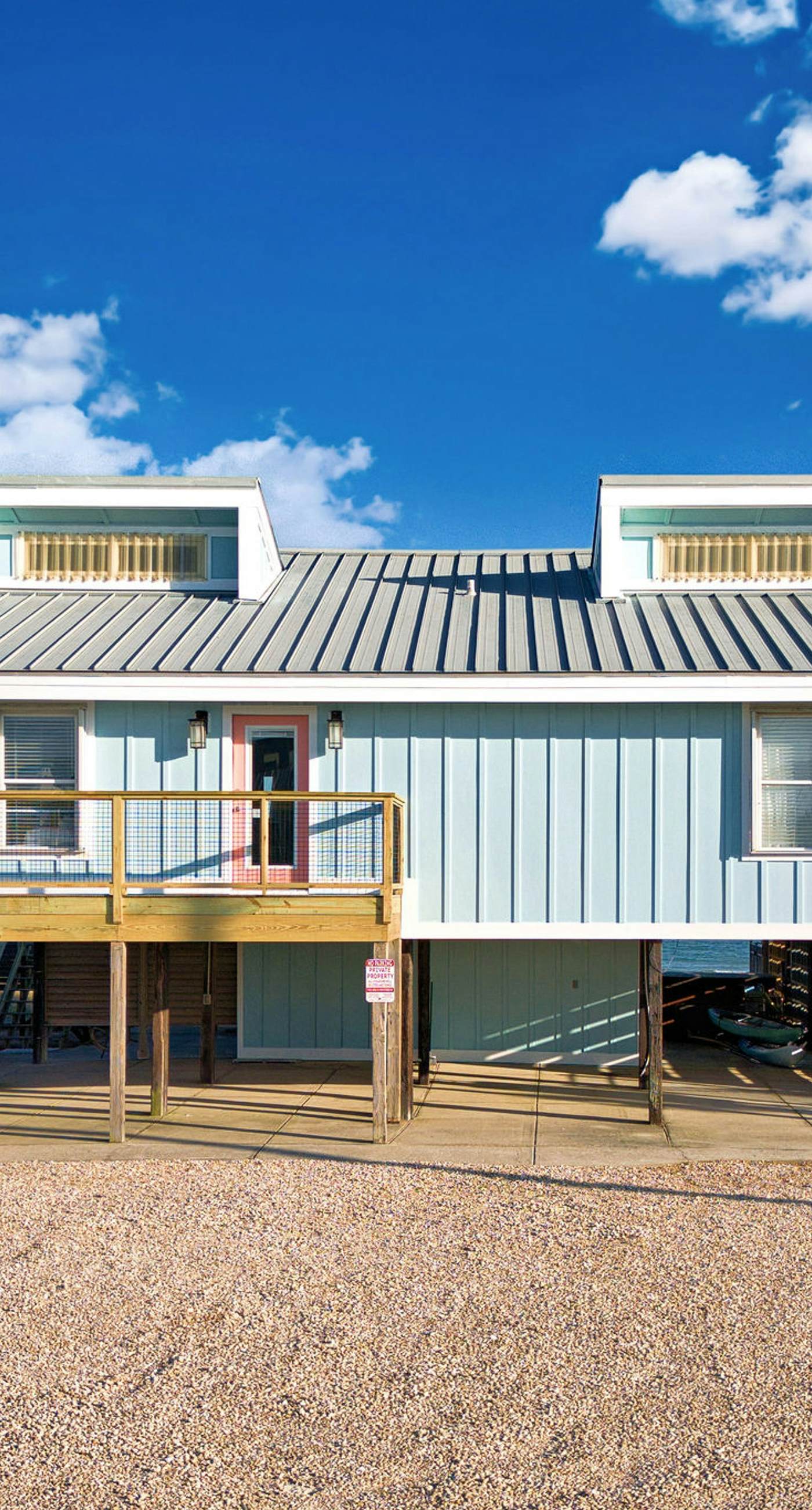 Dog-friendly with Gulf view, pool, balcony, deck, fireplace, central AC, & W&D