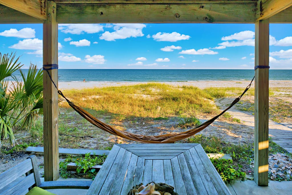 Dog-friendly with Gulf view, pool, balcony, deck, fireplace, central AC, & W&D