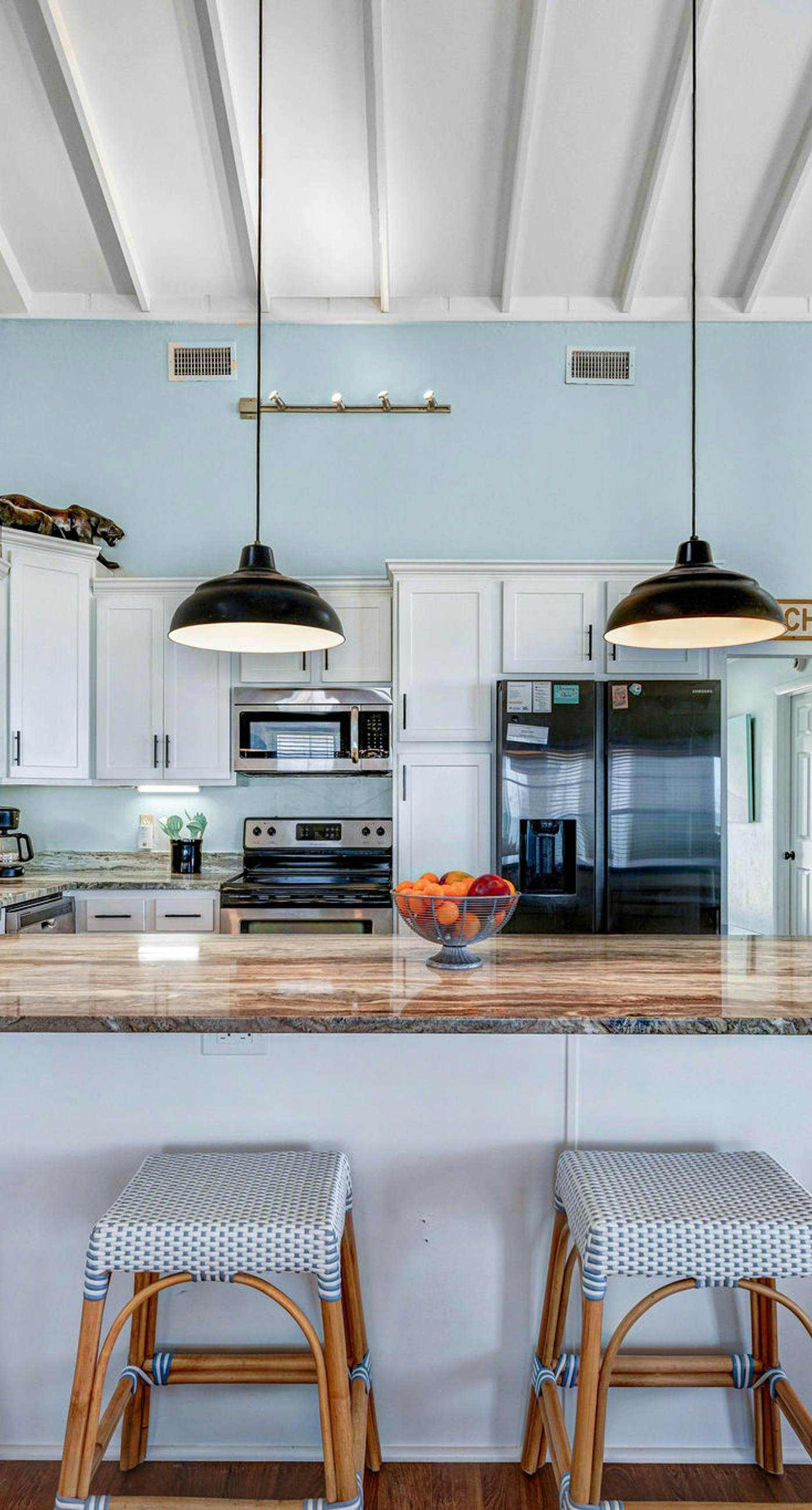 Dog-friendly with Gulf view, pool, balcony, deck, fireplace, central AC, & W&D