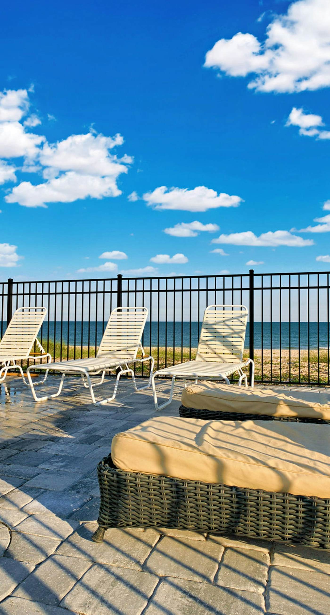 Dog-friendly with Gulf view, pool, balcony, deck, fireplace, central AC, & W&D