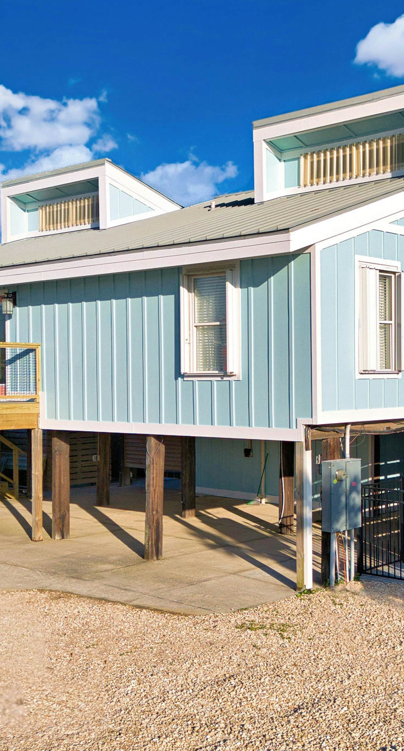 Dog-friendly with Gulf view, pool, balcony, deck, fireplace, central AC, & W&D