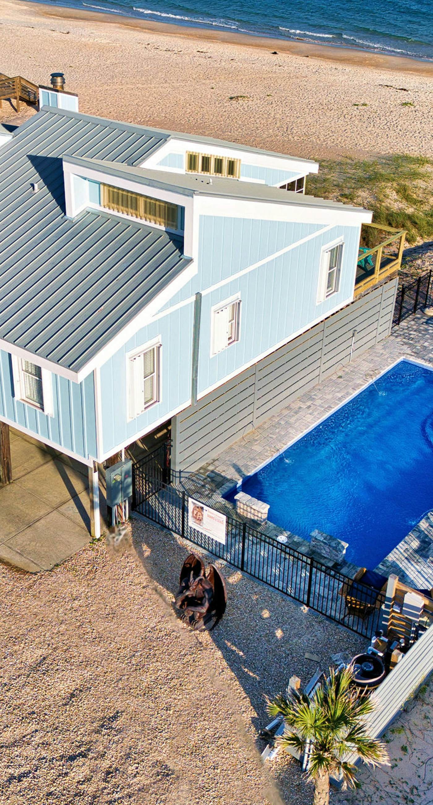 Dog-friendly with Gulf view, pool, balcony, deck, fireplace, central AC, & W&D