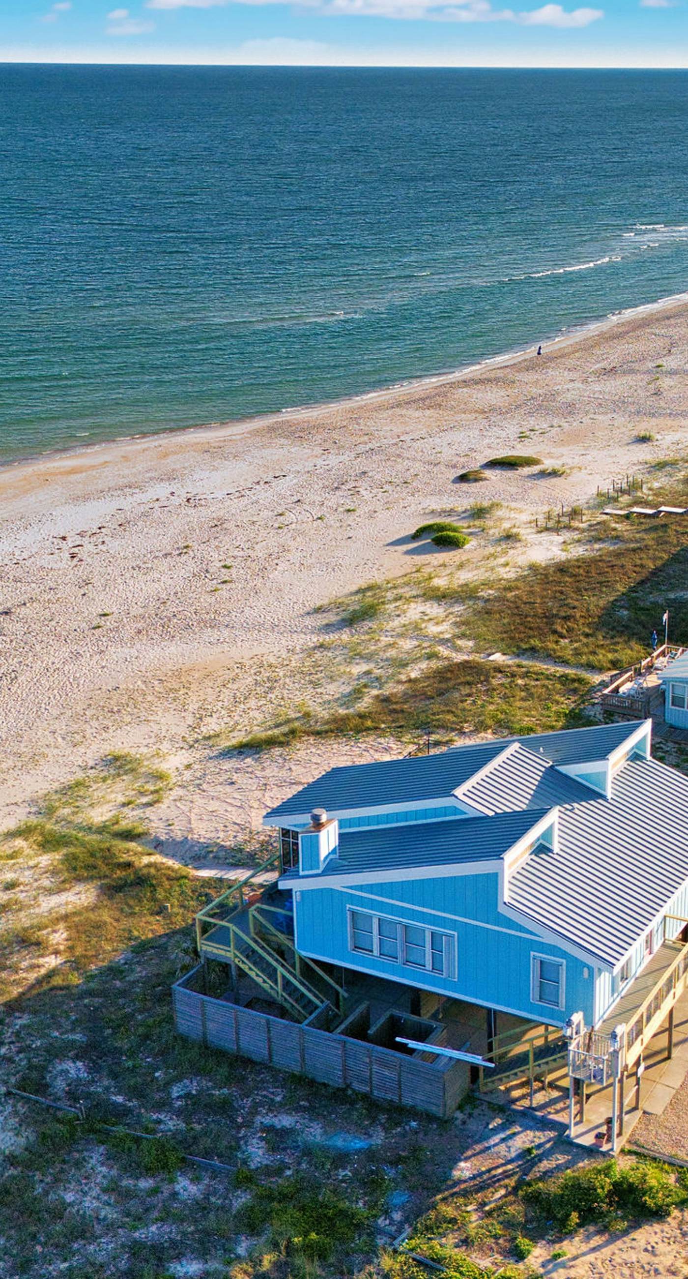 Dog-friendly with Gulf view, pool, balcony, deck, fireplace, central AC, & W&D