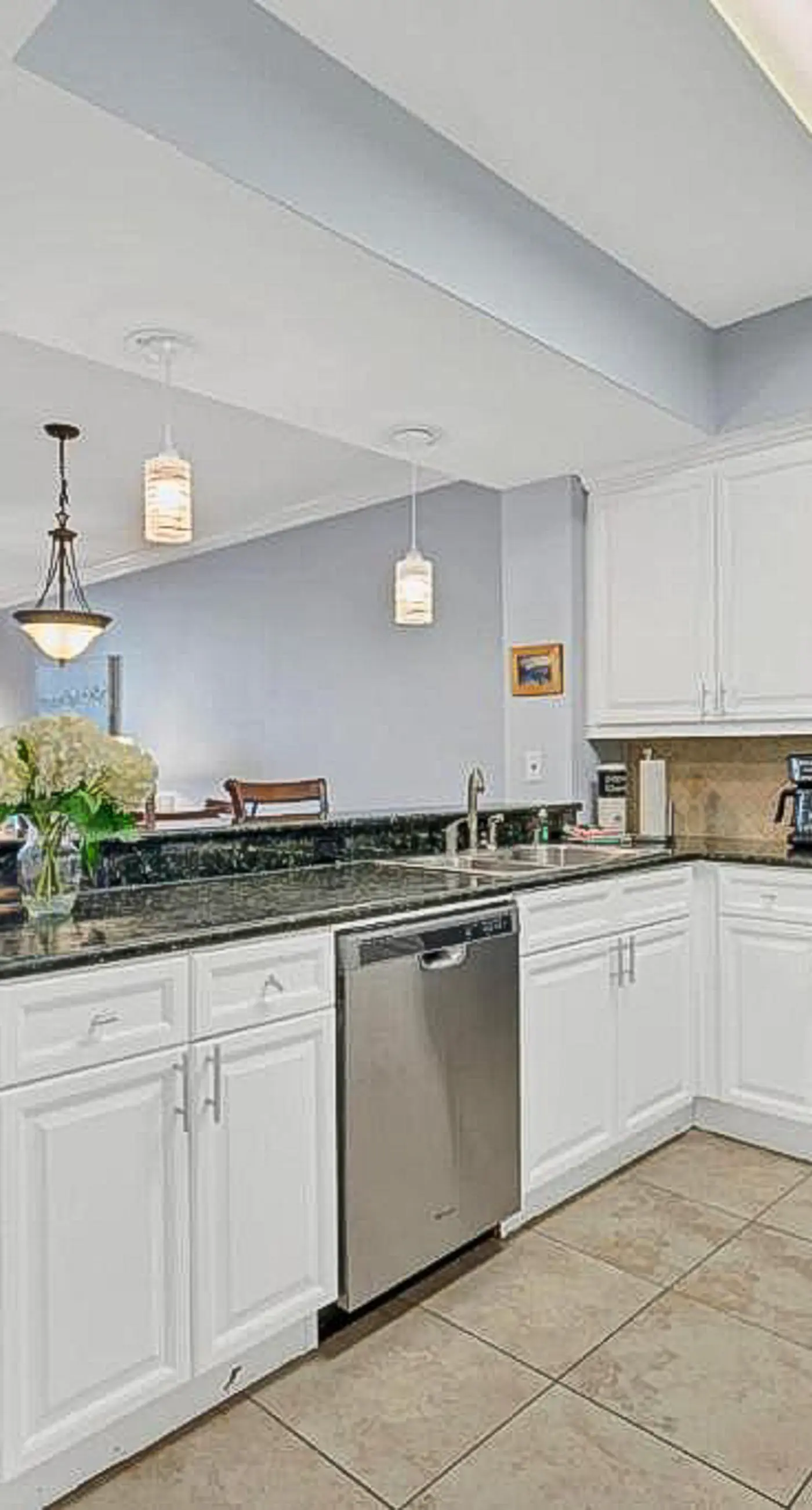 Luxury condo with on-site pools and a convenient central location