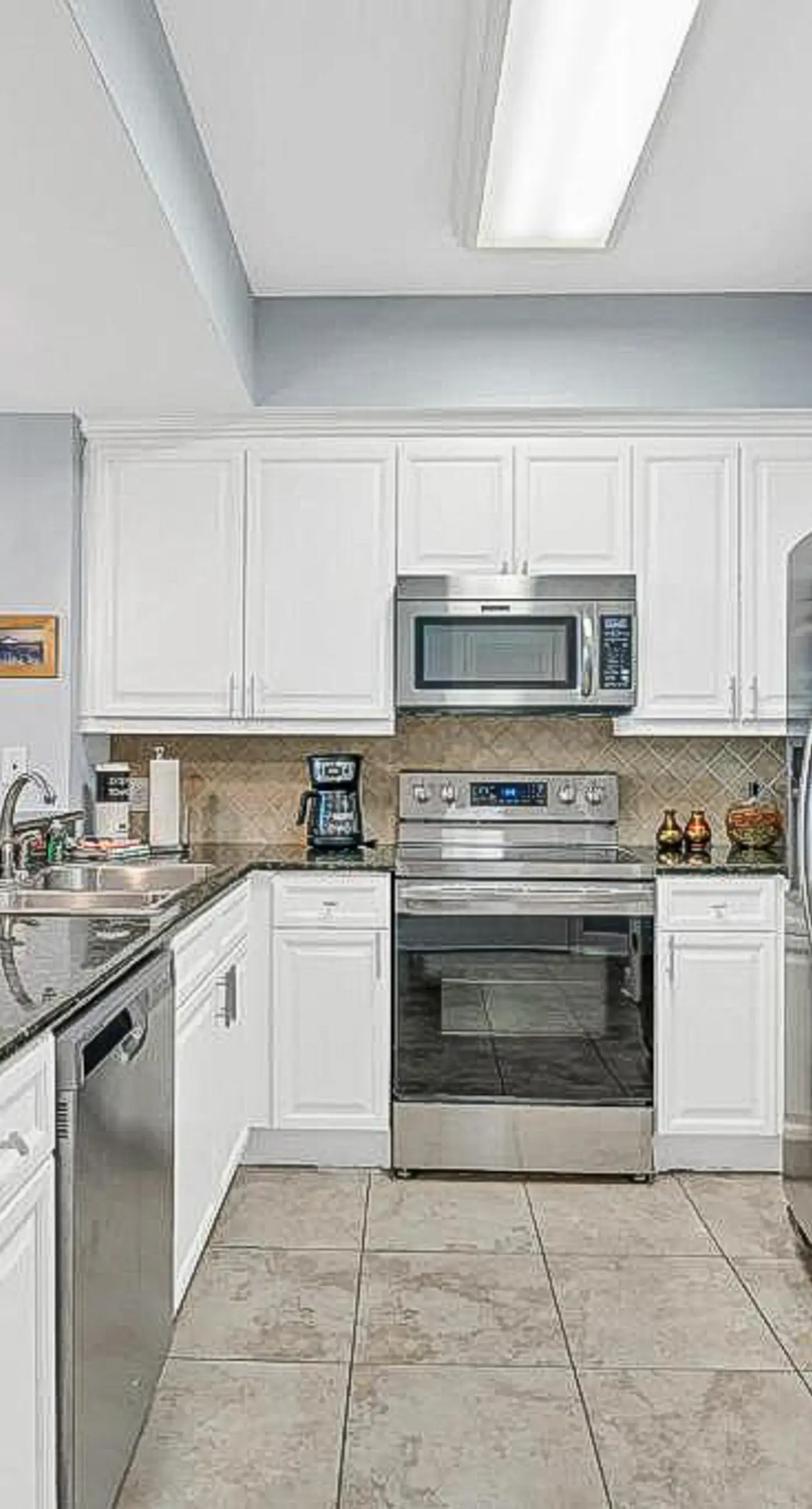 Luxury condo with on-site pools and a convenient central location