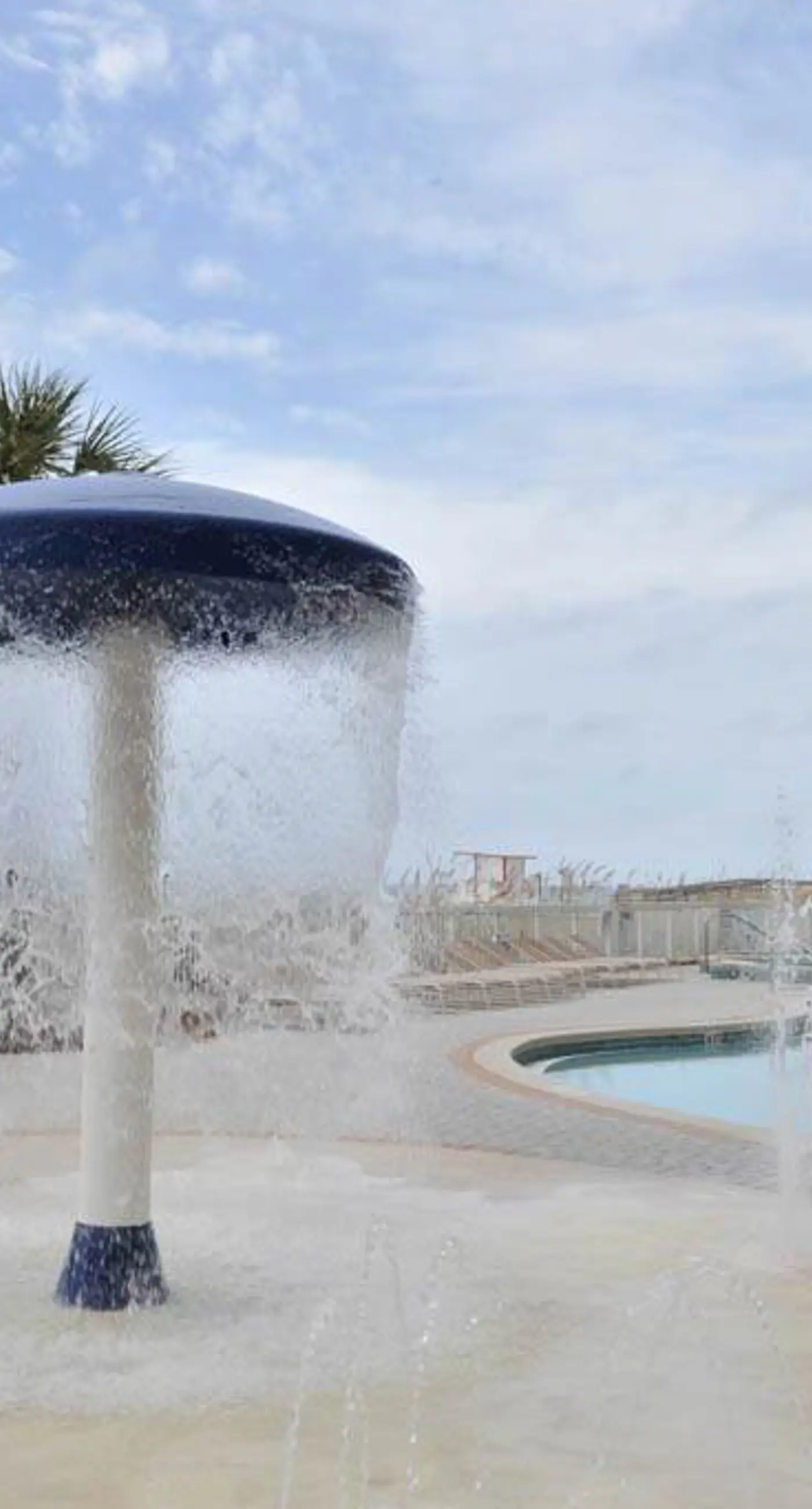 Luxury condo with on-site pools and a convenient central location