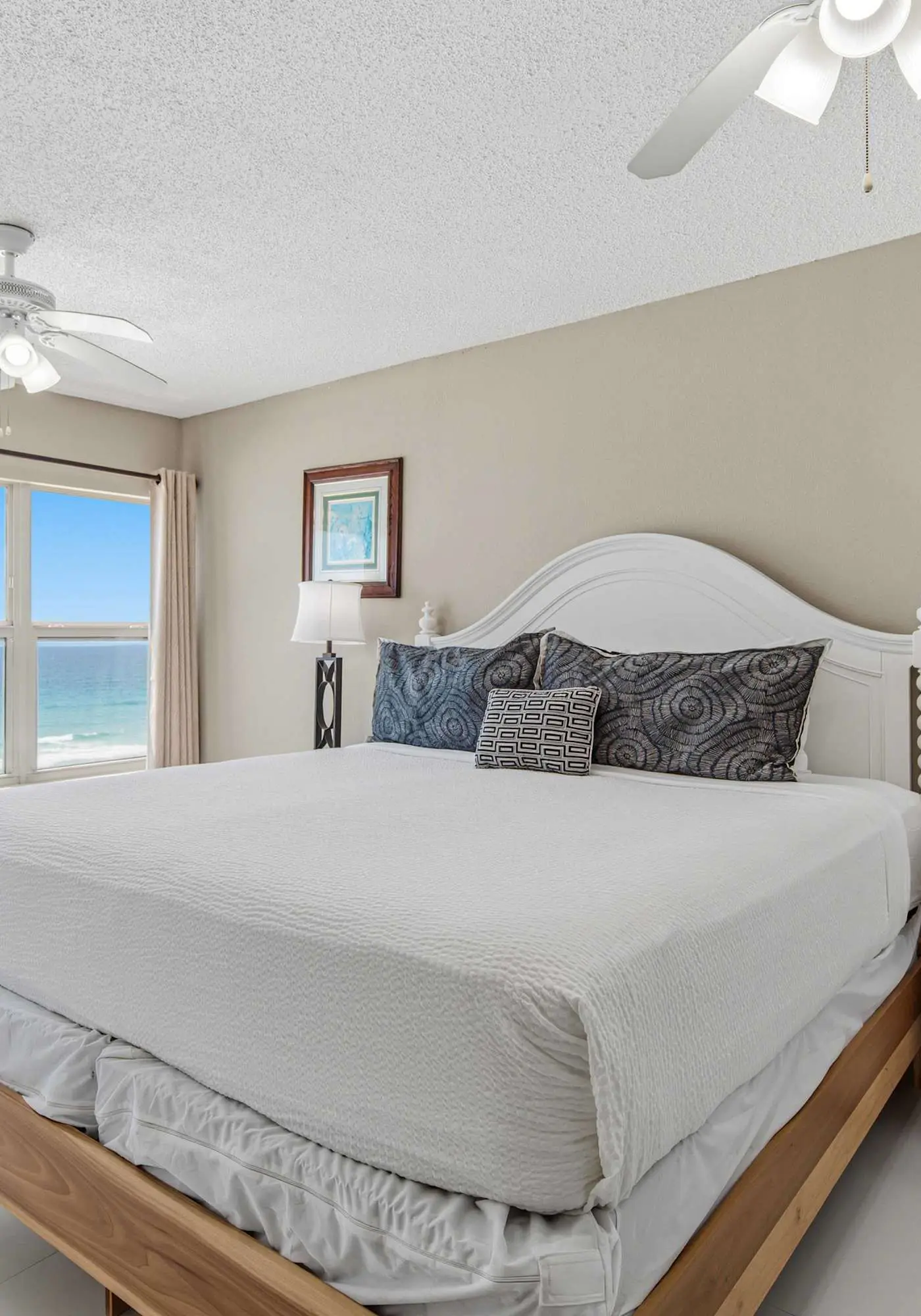 Spacious beachfront condo with full kitchen, shared pool and beach access