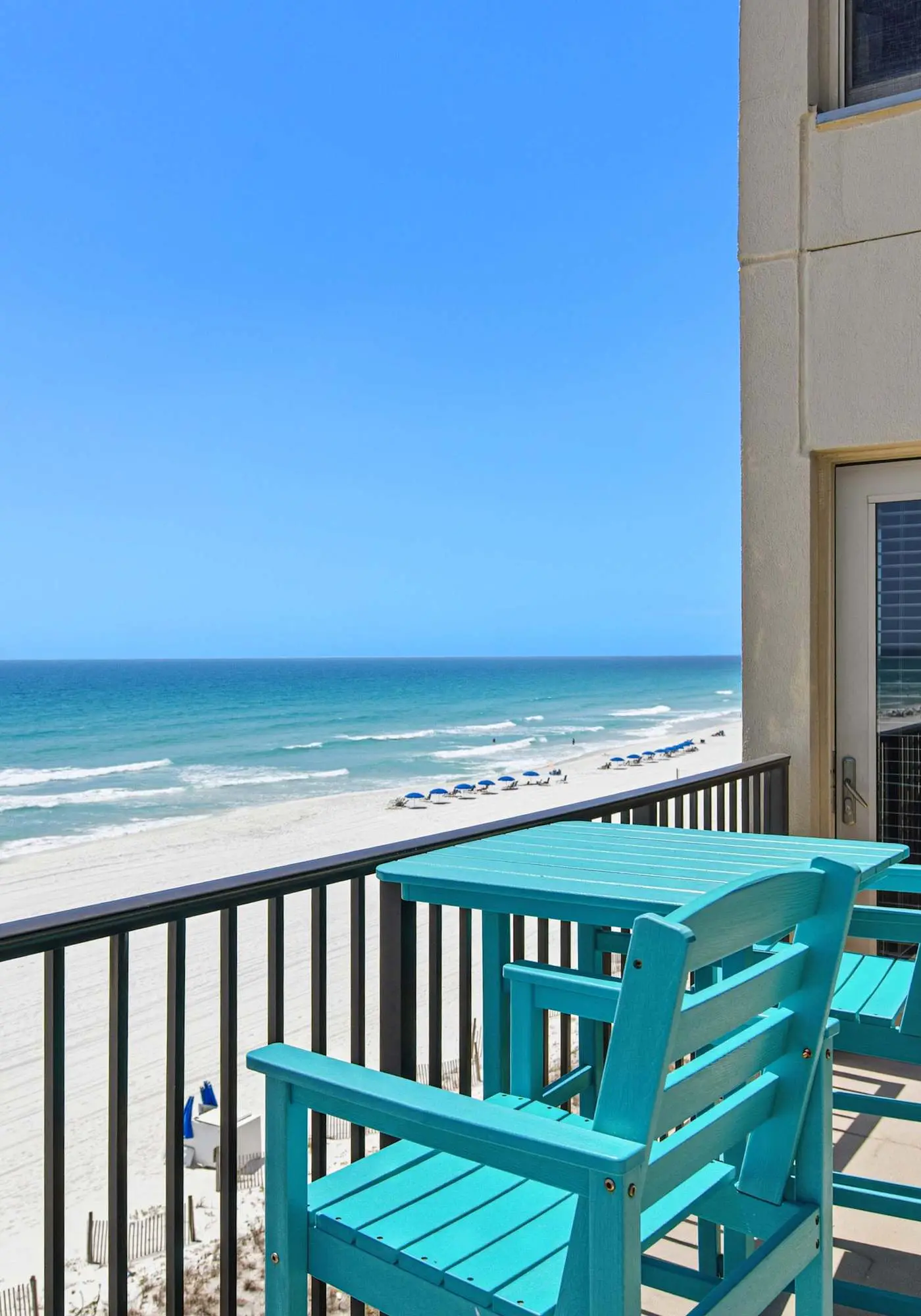 Spacious beachfront condo with full kitchen, shared pool and beach access