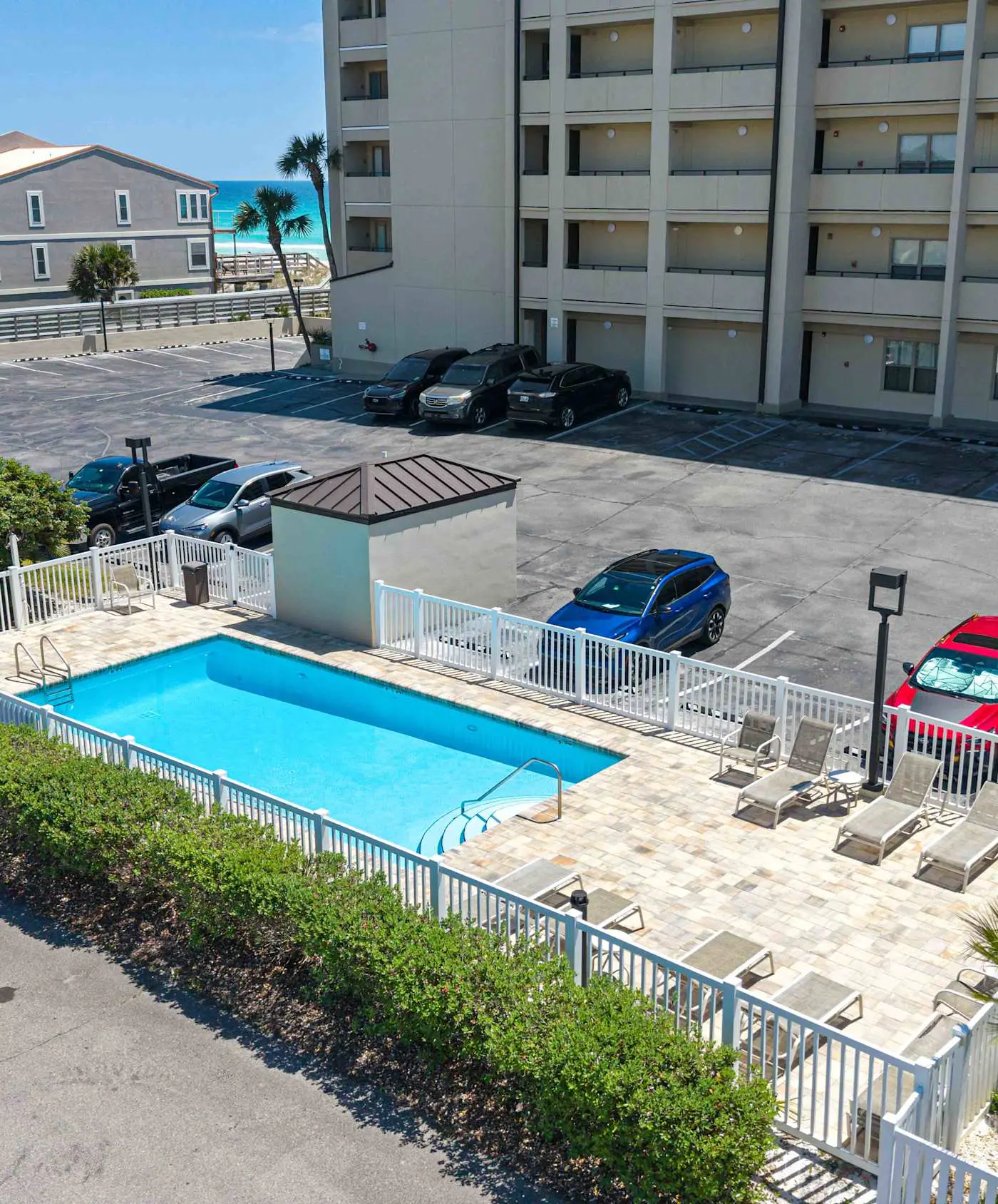 Spacious beachfront condo with full kitchen, shared pool and beach access