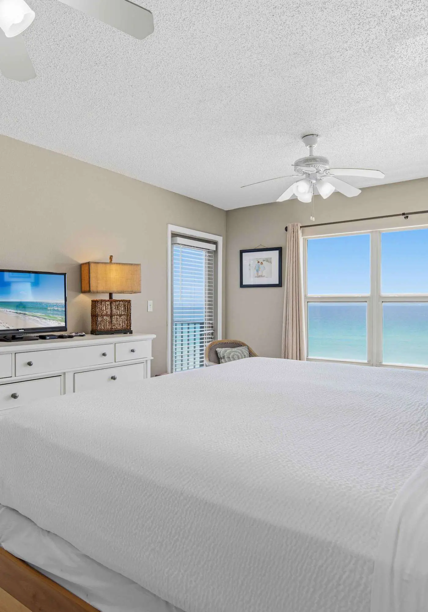 Spacious beachfront condo with full kitchen, shared pool and beach access