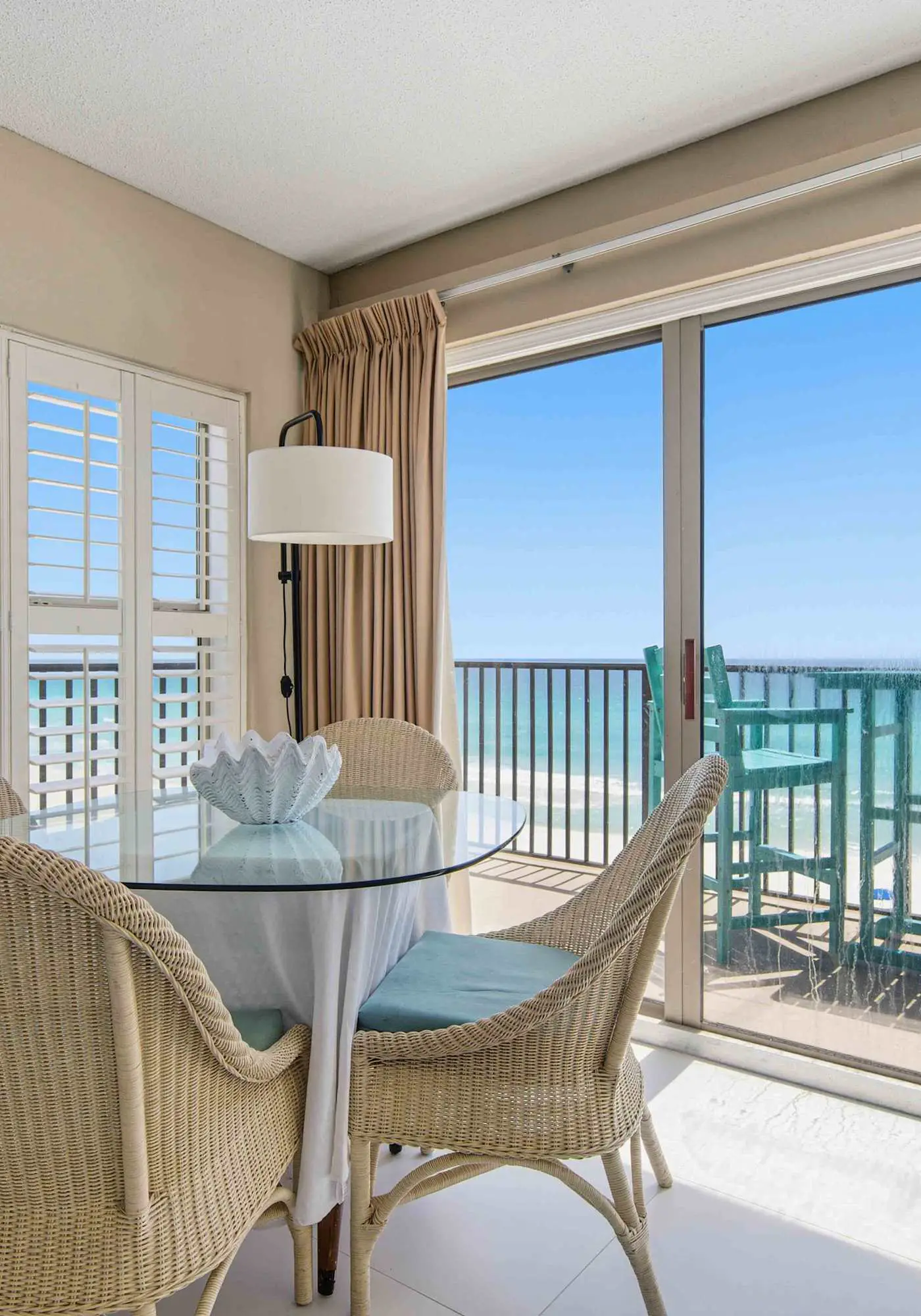Spacious beachfront condo with full kitchen, shared pool and beach access